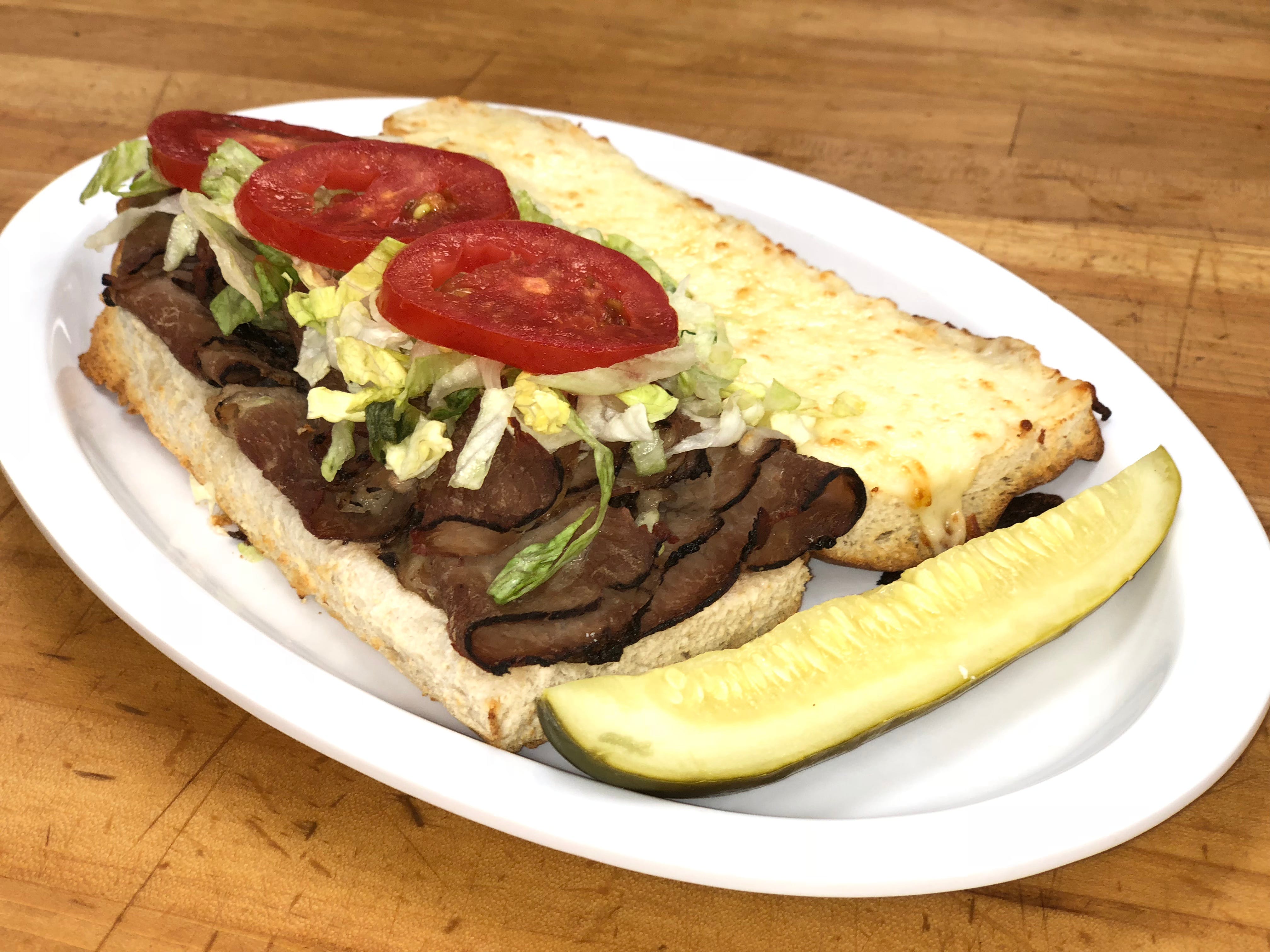 Order Roast Beef Grinder - Quarter food online from Bellacino Pizza & Grinders store, South Point on bringmethat.com