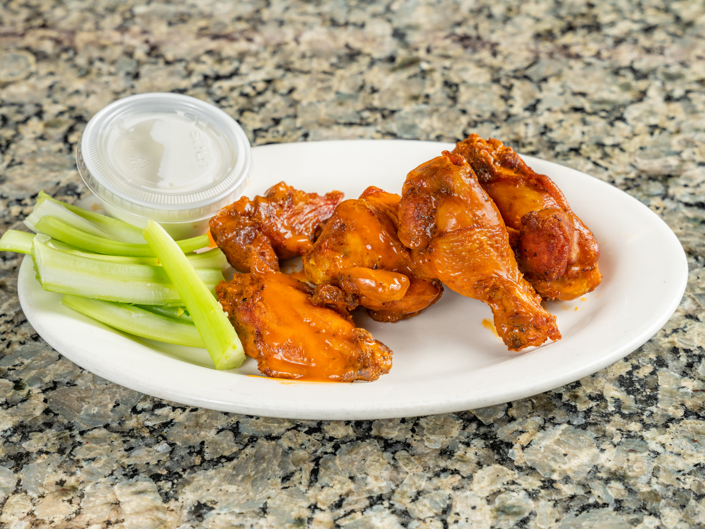 Order Jumbo Buffalo Wings food online from Planet Pizza store, Greenwich on bringmethat.com