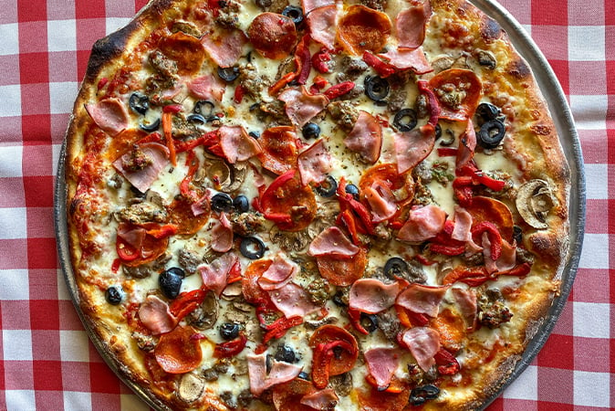 Order 12" New York Village food online from Russo's Pizza store, Galveston on bringmethat.com