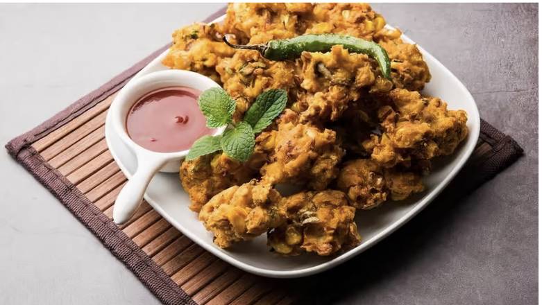 Order Vegetable Pakora food online from India Oven - Citrus Heights store, Citrus Heights on bringmethat.com