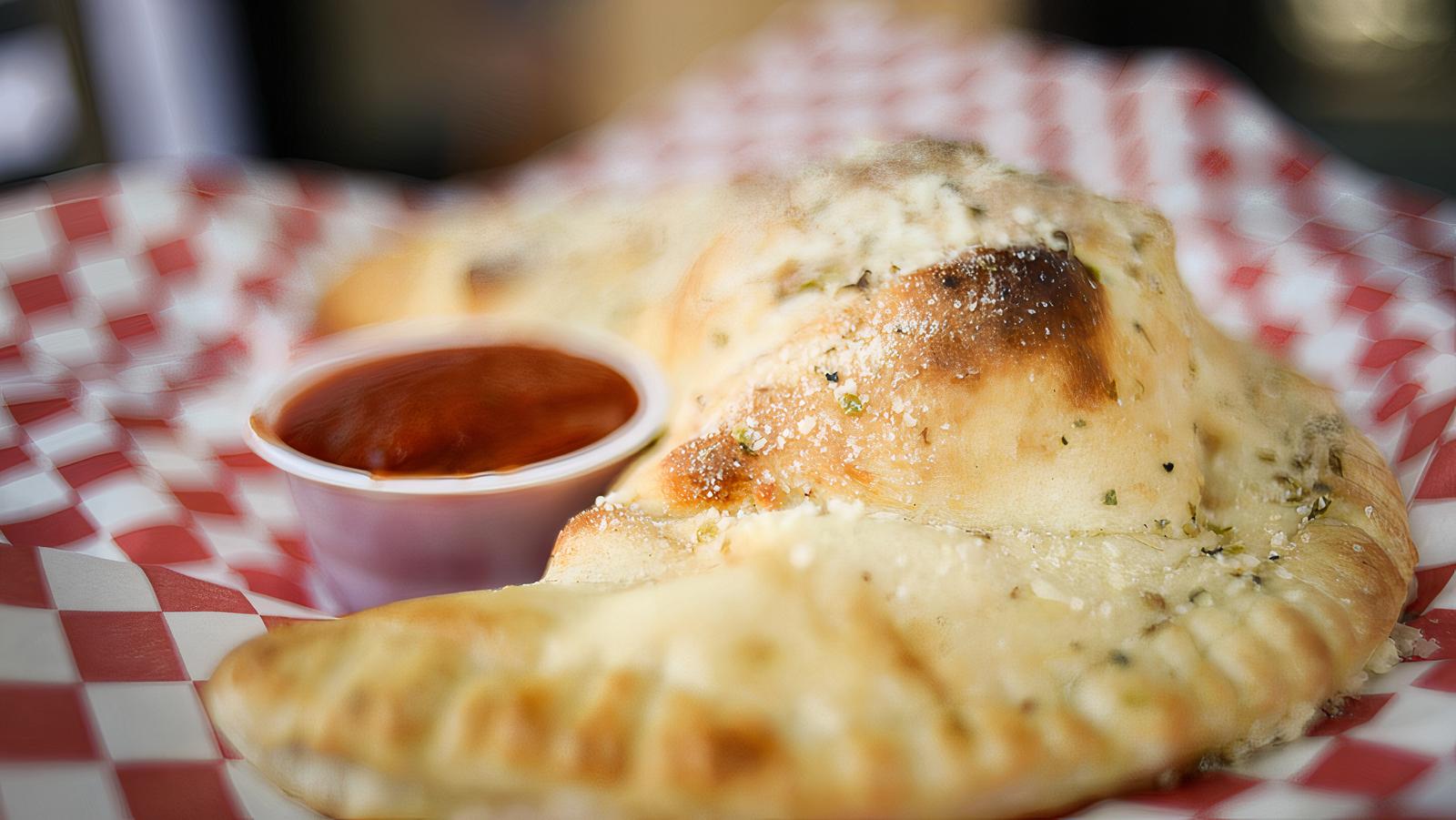 Order Spinach Calzone food online from Sf Hole In The Wall Pizza store, San Francisco on bringmethat.com