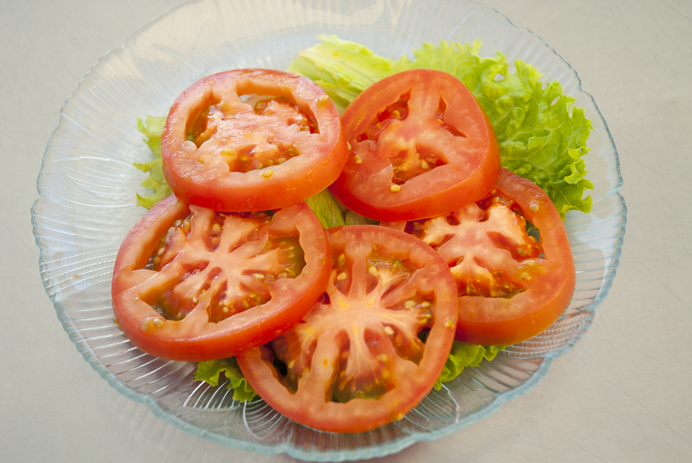 Order Sliced Tomatoes food online from Us Egg store, Tempe on bringmethat.com