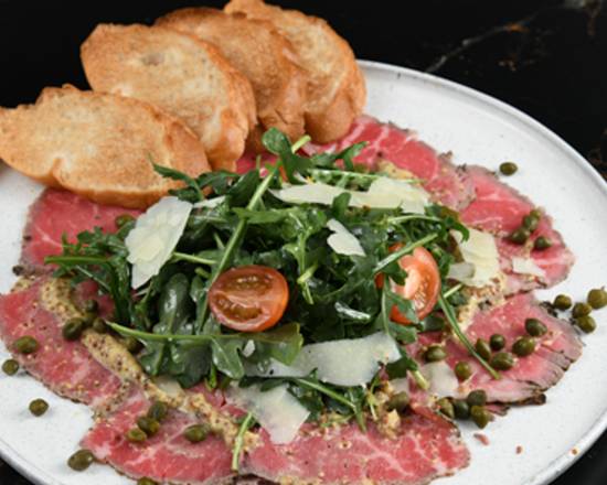 Order Beef Carpaccio food online from Simms Steakhouse store, Golden on bringmethat.com