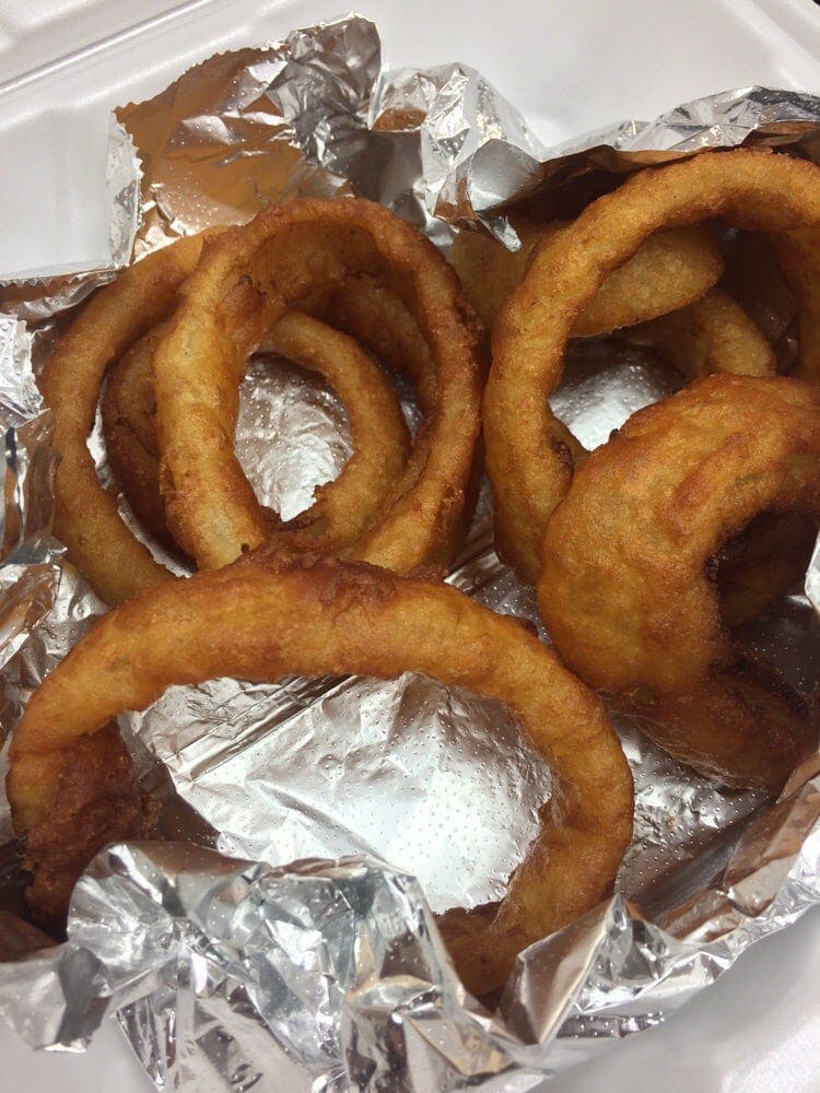 Order Onion Rings - Appetizer food online from Red Tomato Pizzeria store, Mclean on bringmethat.com