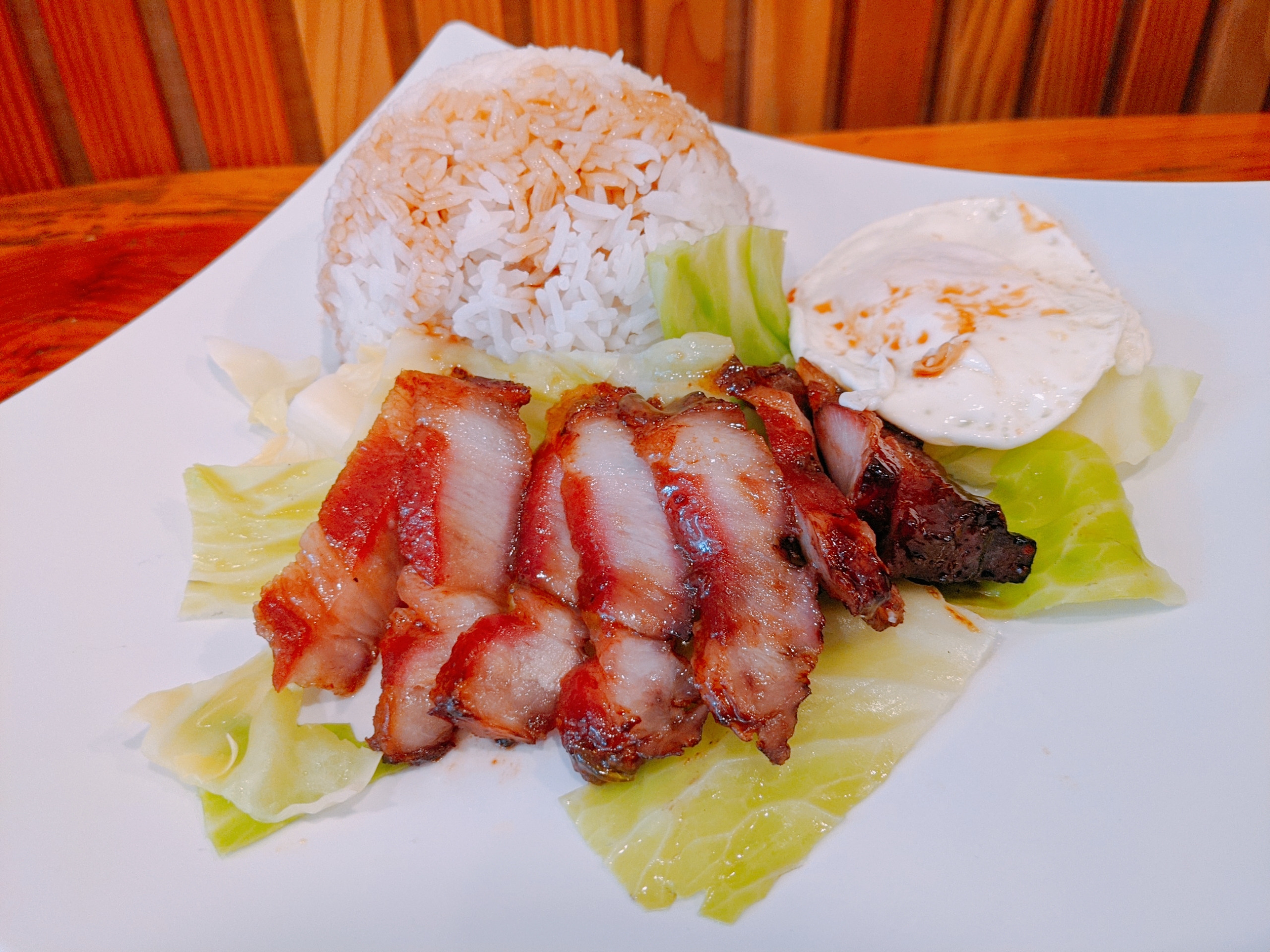 Order (Thur & Fri ONLY) Barbeque Pork Belly & Pan-fried Egg with Rice food online from Bite Feast store, Davis on bringmethat.com