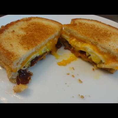 Order Bacon & Eggs Breakfast Sandwich food online from Newport Quik Stop Cafe store, San Diego on bringmethat.com