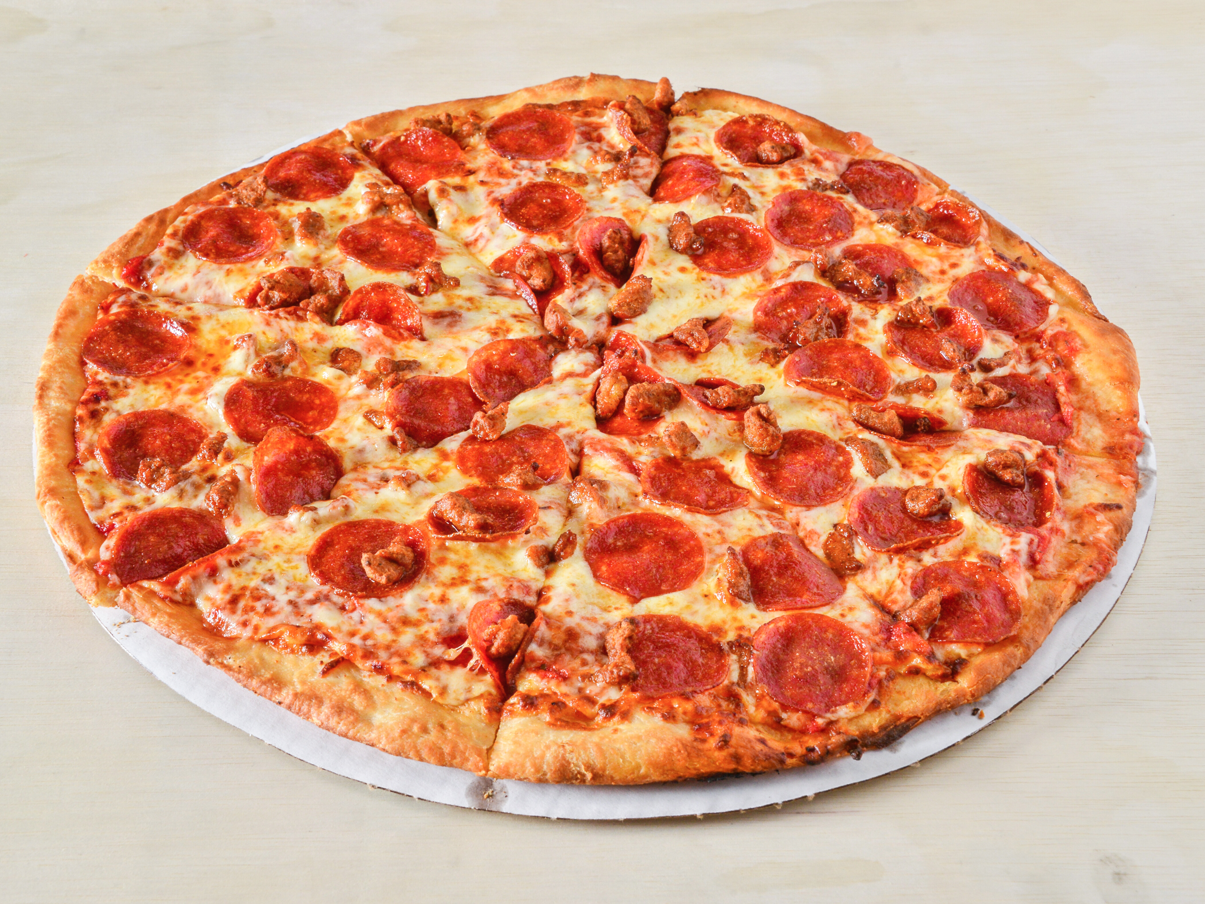 Order Pizza with 2 Toppings food online from Cavoni Pizza & Grinders store, Battle Creek on bringmethat.com