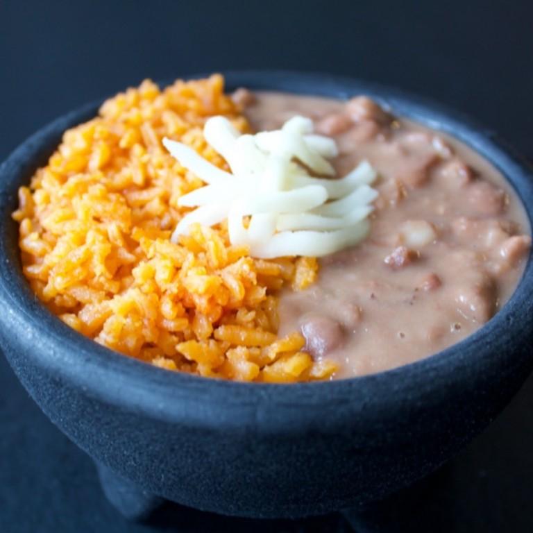 Order Beans & Rice food online from Tatas Tacos store, Chicago on bringmethat.com