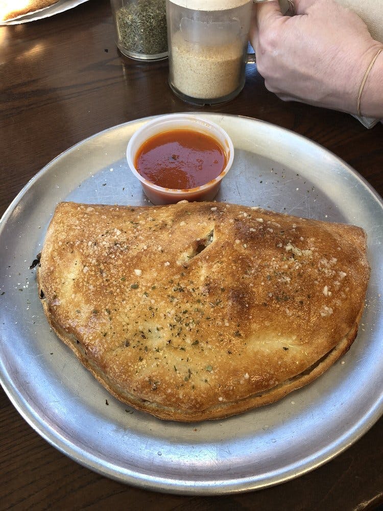 Order Cheese Calzone - Calzone food online from Primo Pizza Ny Style store, Cary on bringmethat.com