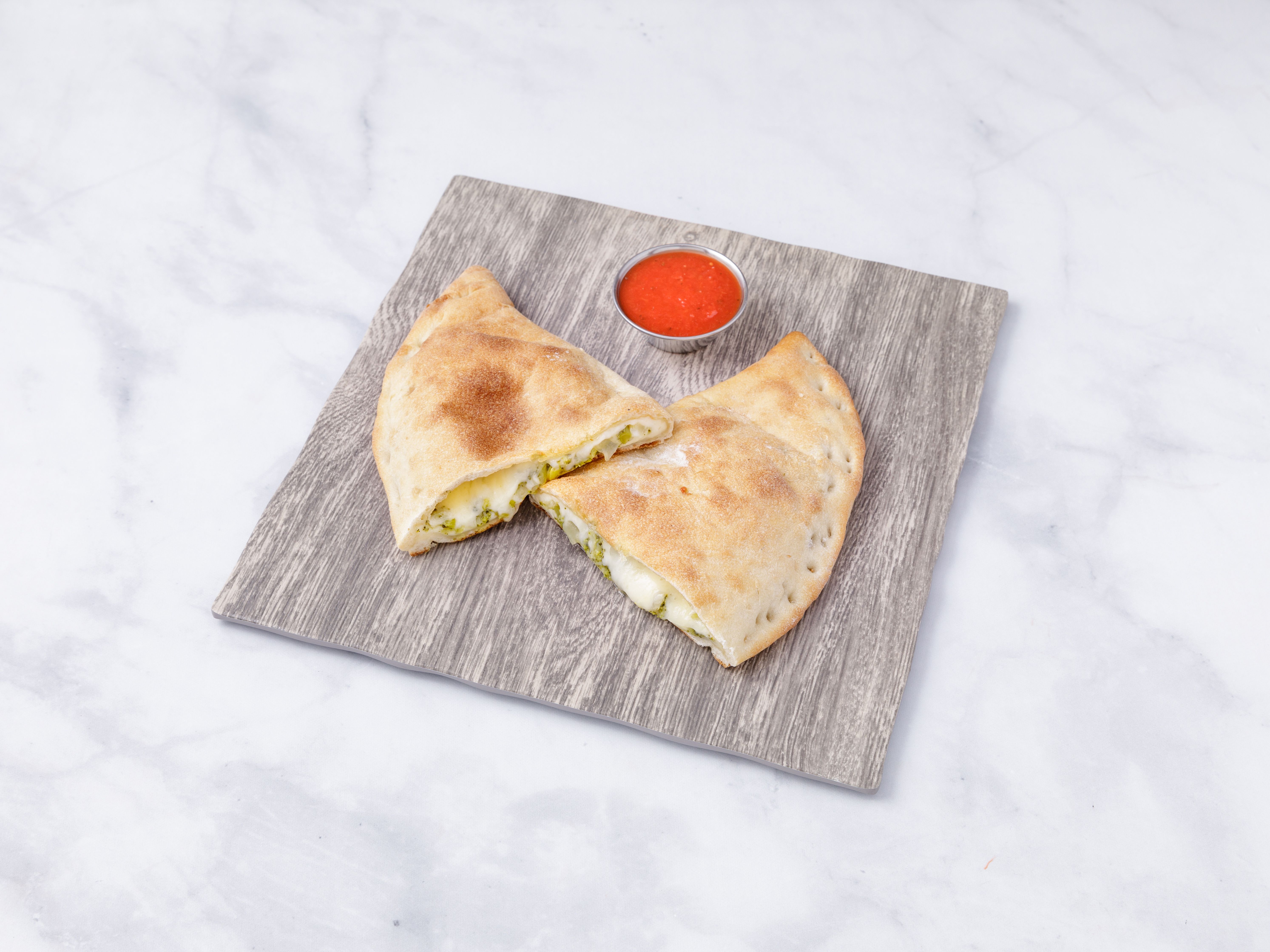 Order Broccoli Calzone food online from Jerusalem Pizza store, Highland Park on bringmethat.com