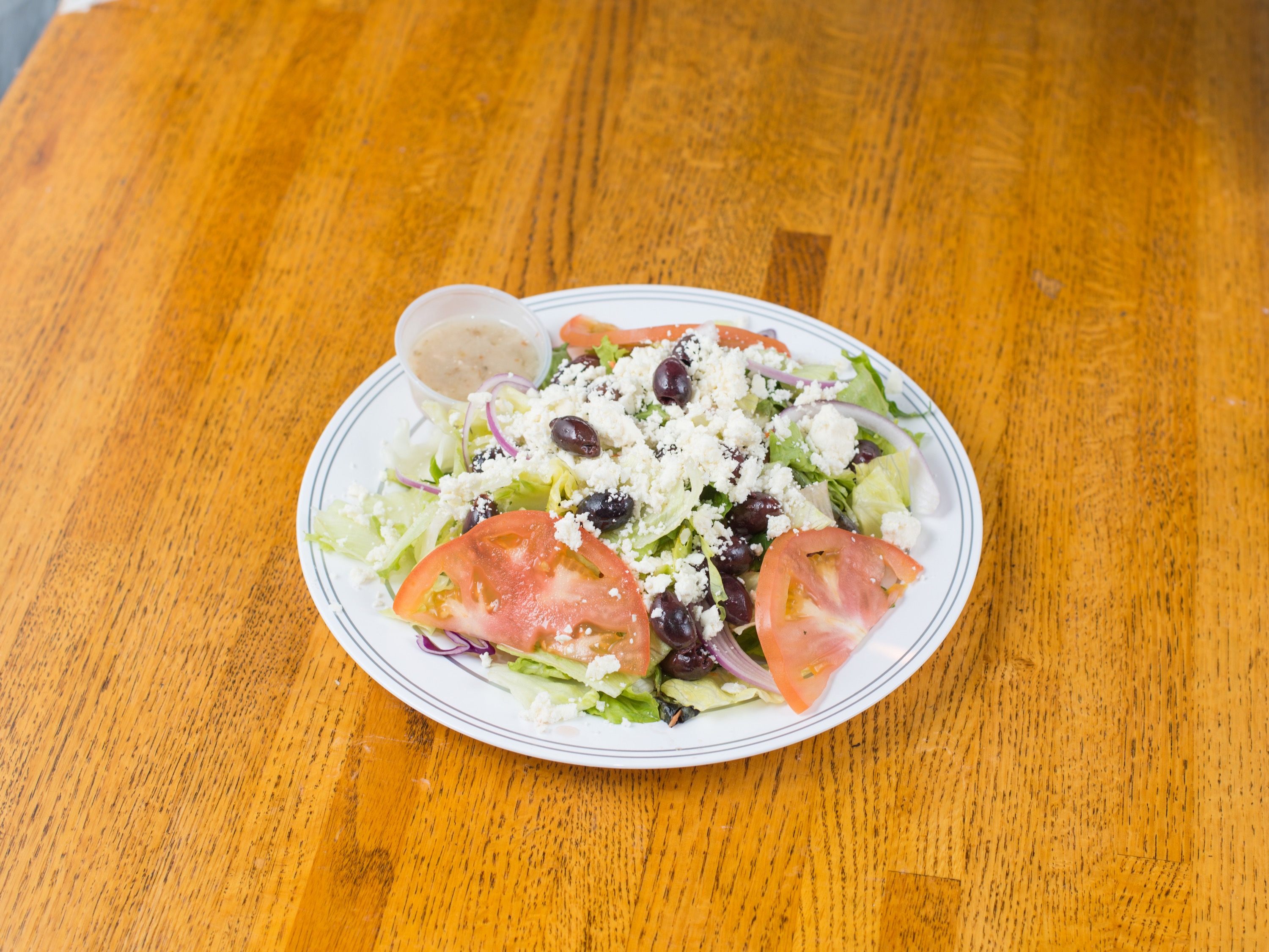 Order Greek Salad food online from Russell's Barbecue store, Elmwood Park on bringmethat.com
