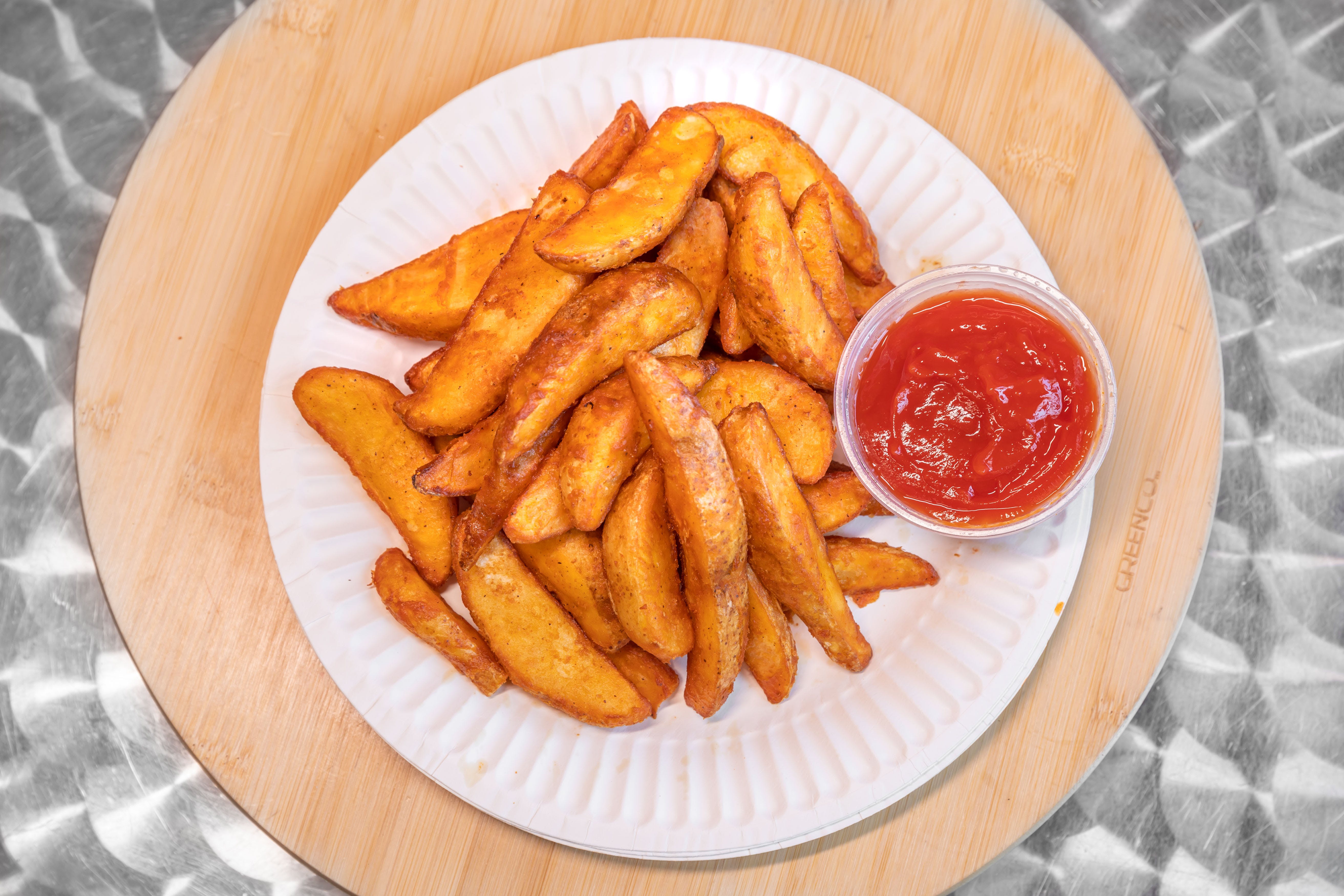 Order Potato Wedges - Appetizer food online from Promenade Pizza store, Anaheim on bringmethat.com
