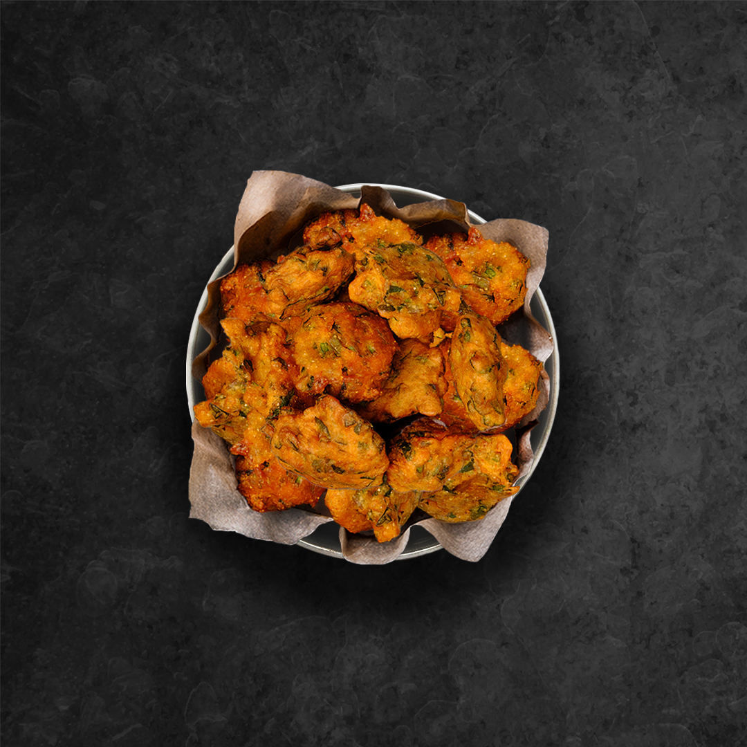Order Fiery Vegetable Pakora food online from United Kitchens of India store, Chicopee on bringmethat.com