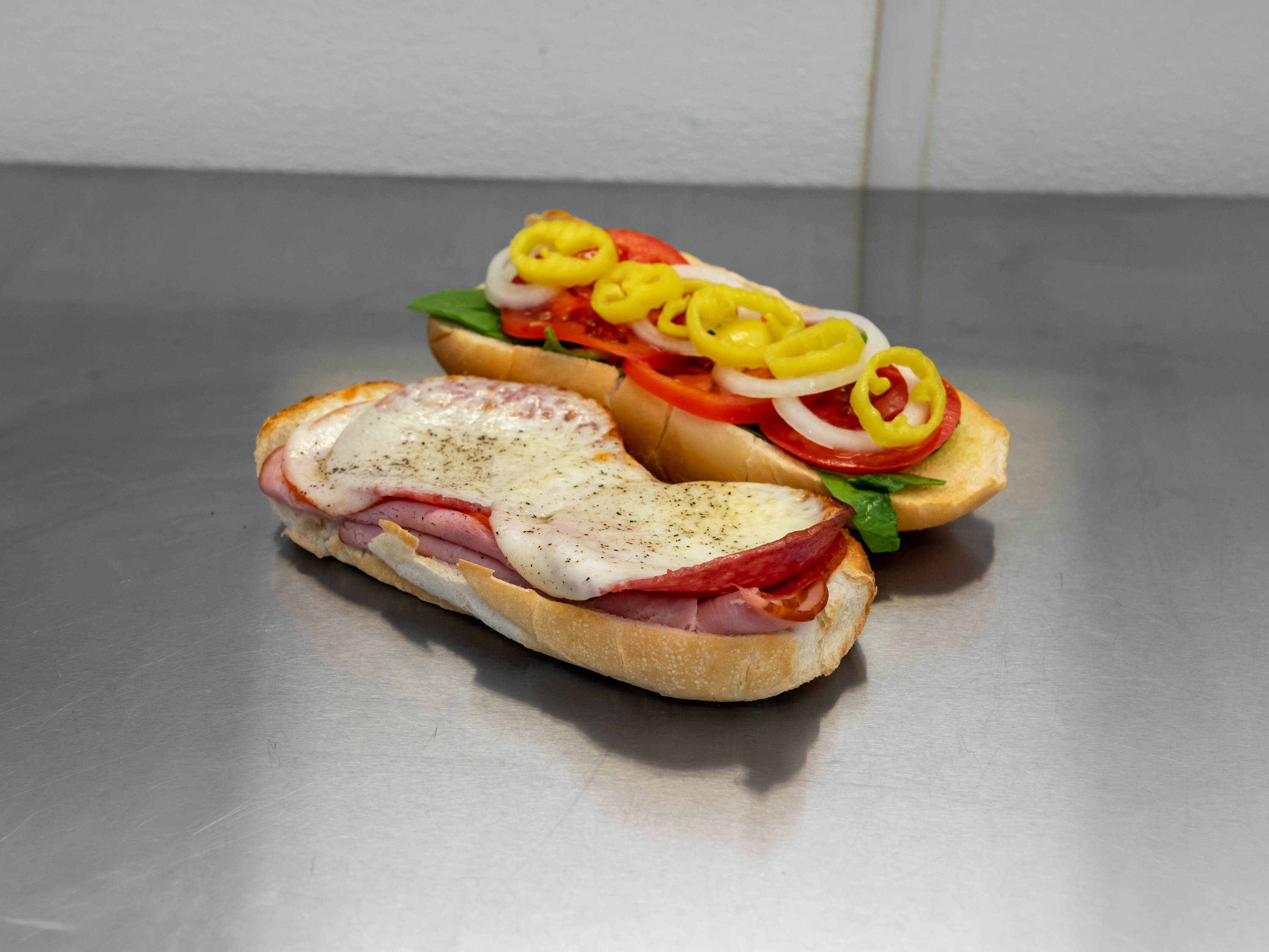 Order 2. Italian Sandwich food online from Sandwich Man store, Whitehall on bringmethat.com