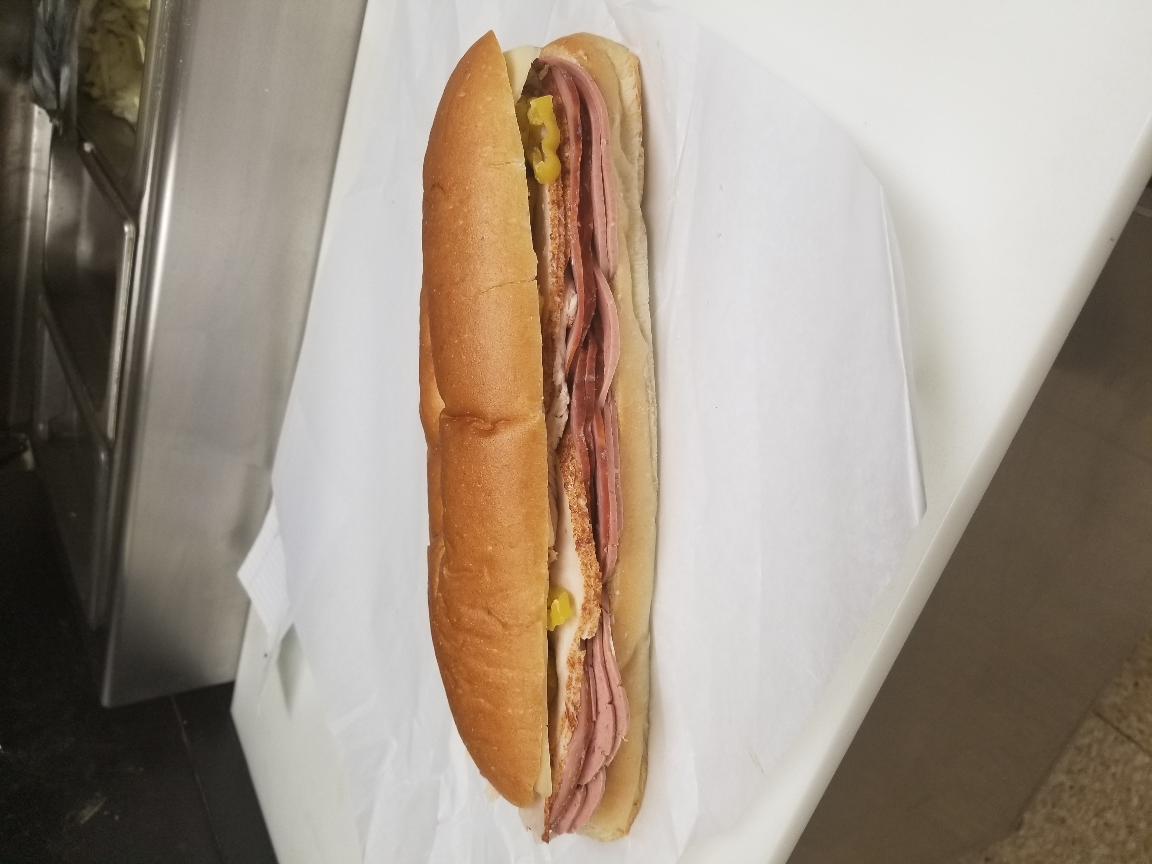 Order American Asst'd Sub food online from H & A Deli store, Rochester on bringmethat.com