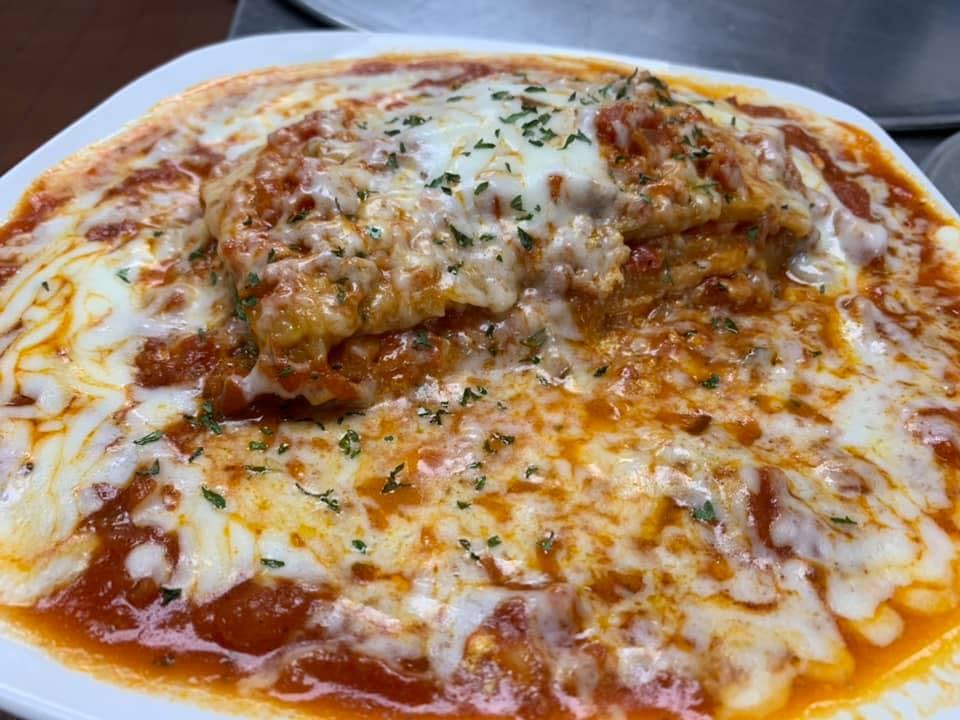 Order Lasagna - Pasta food online from Mario's Pizza Deland store, Deland on bringmethat.com