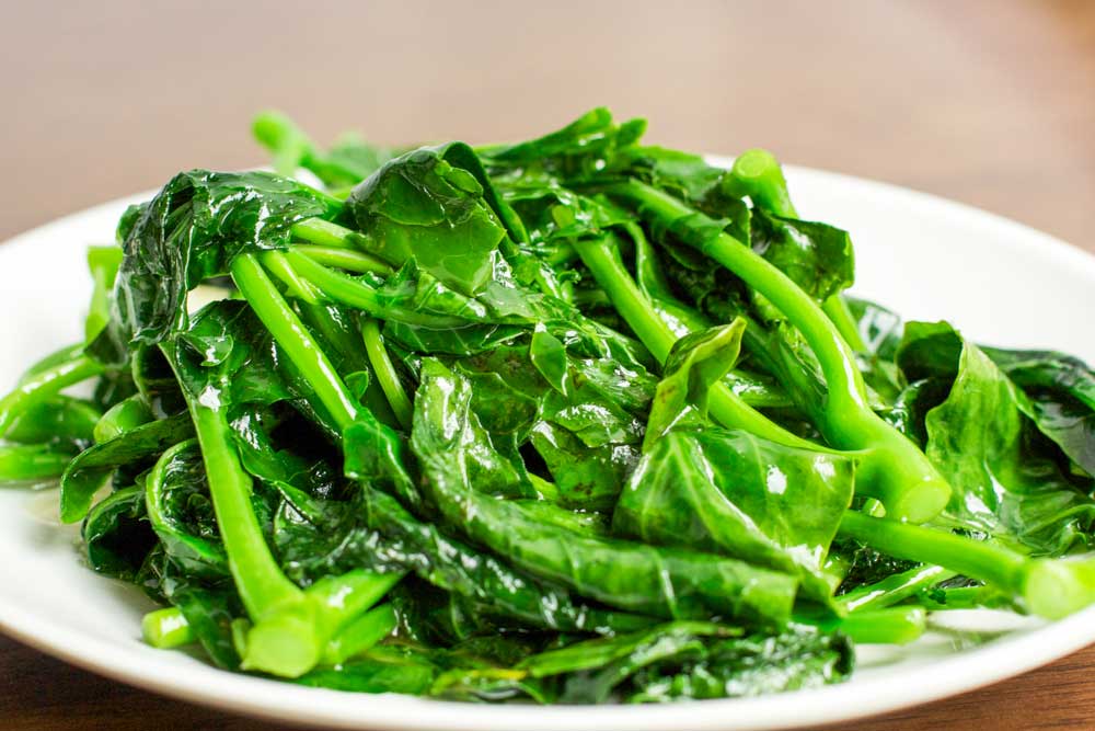 Order 2. Fresh Garlic Sauteed with Chinese Broccoli food online from Jade Grille store, Pittsburgh on bringmethat.com