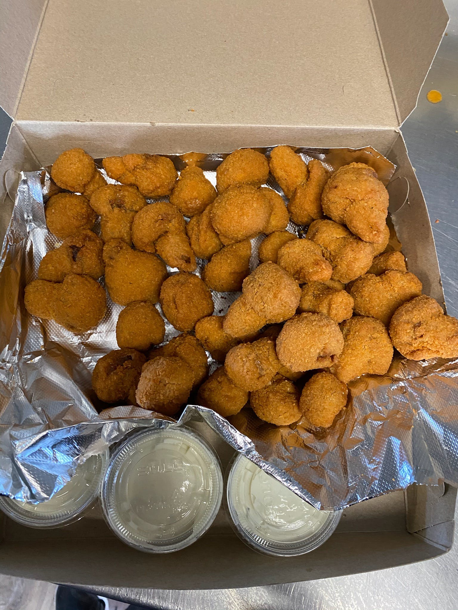 Order Fried Mushrooms - Side food online from Amico Pizza store, Rochester on bringmethat.com