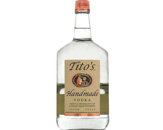 Order Tito's Handmade Vodka 1.75ml, vodka (40% ABV) food online from Van Ness Liquors store, San Francisco on bringmethat.com
