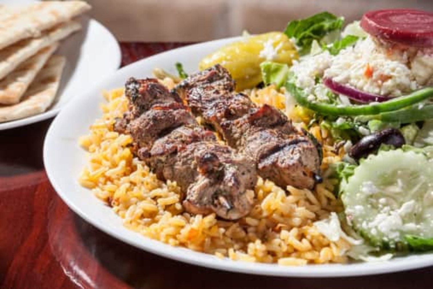 Order LAMB SKEWERS (SOULVAKI) 2PC food online from Little Greek Fresh Grill store, Youngstown on bringmethat.com