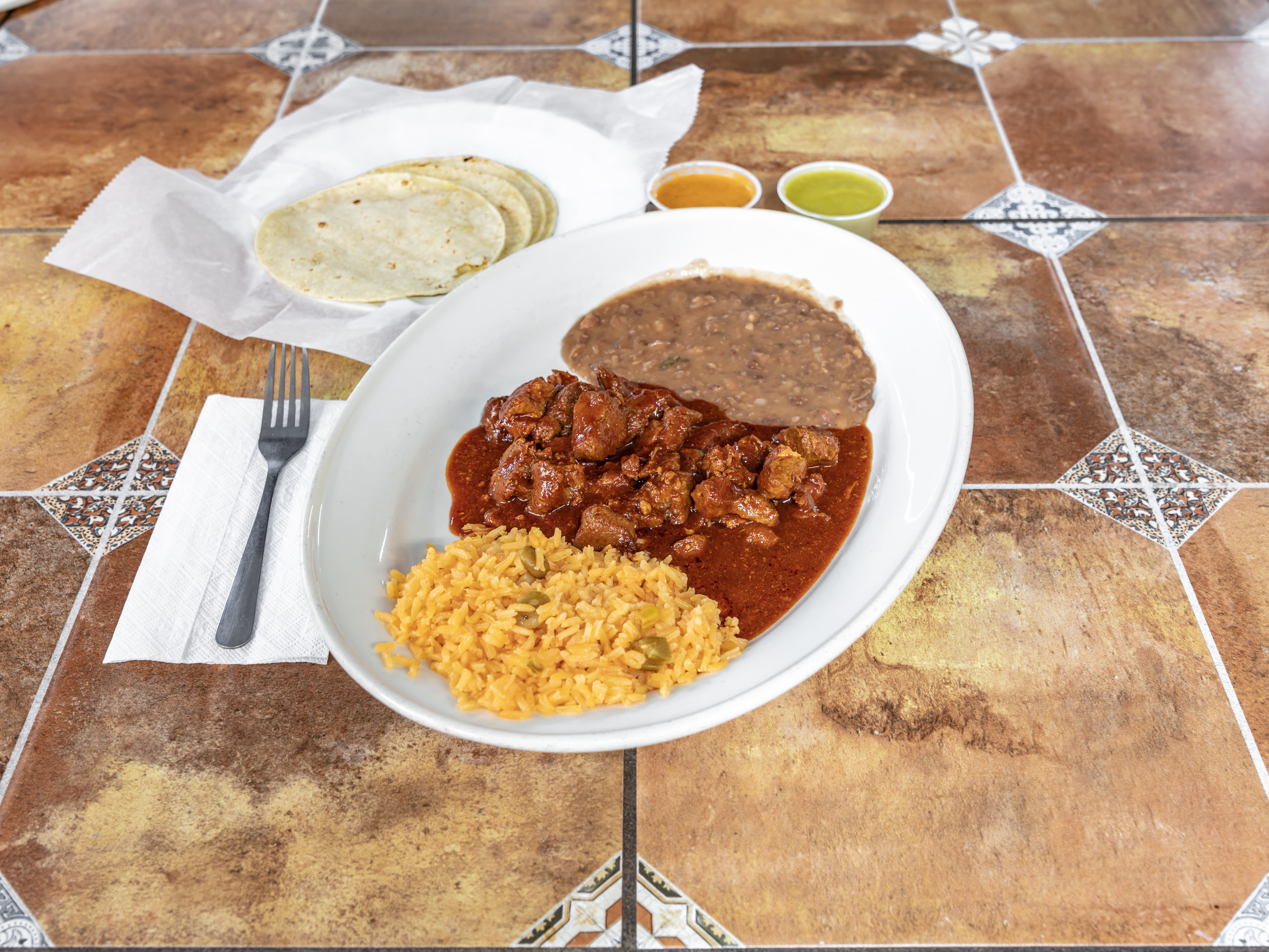 Order Opcion Guisado food online from Tito Meat Market & Taqueria store, Balch Springs on bringmethat.com