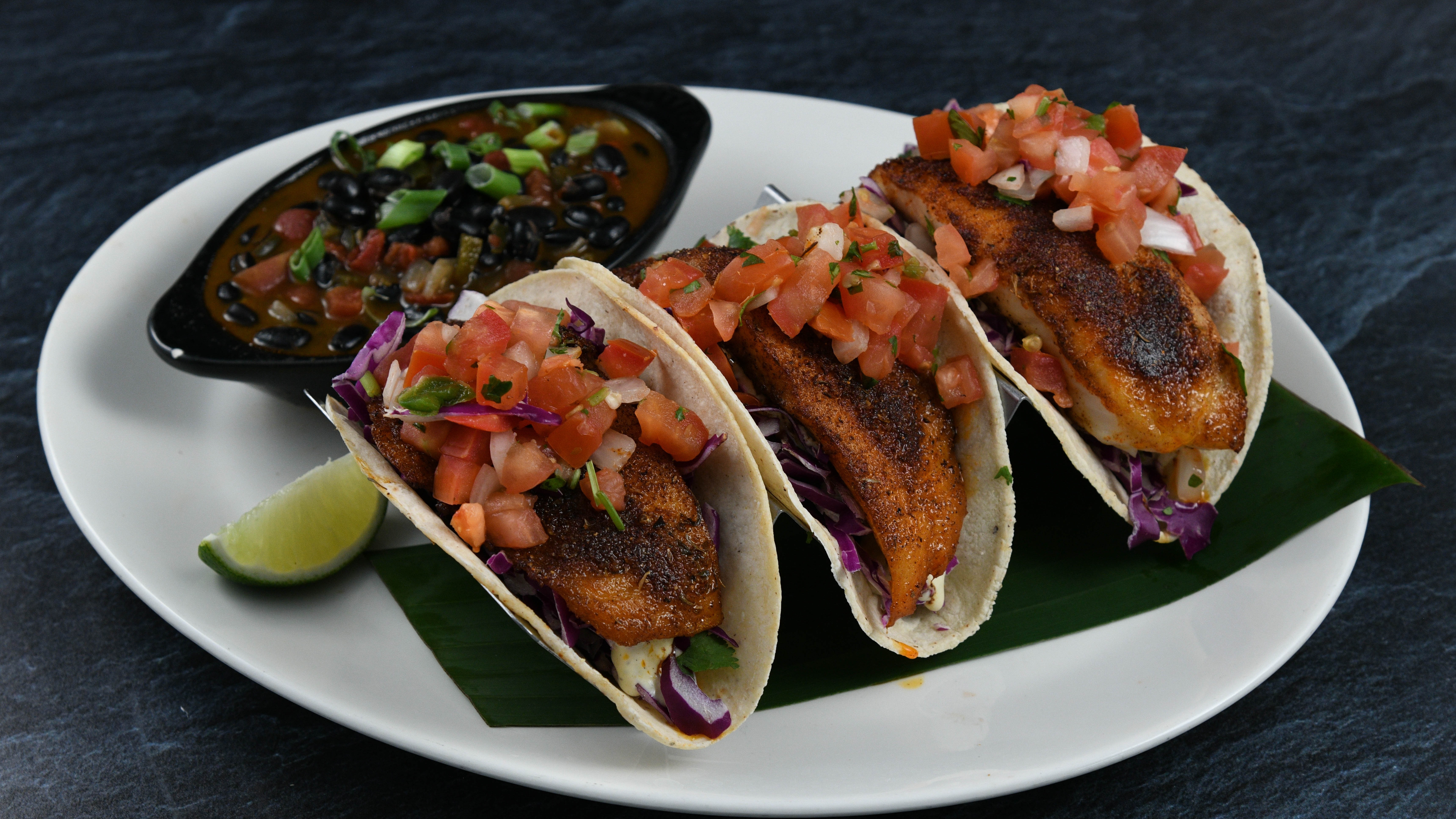 Order Fish Taco Blackened food online from Rainforest Cafe store, Tempe on bringmethat.com