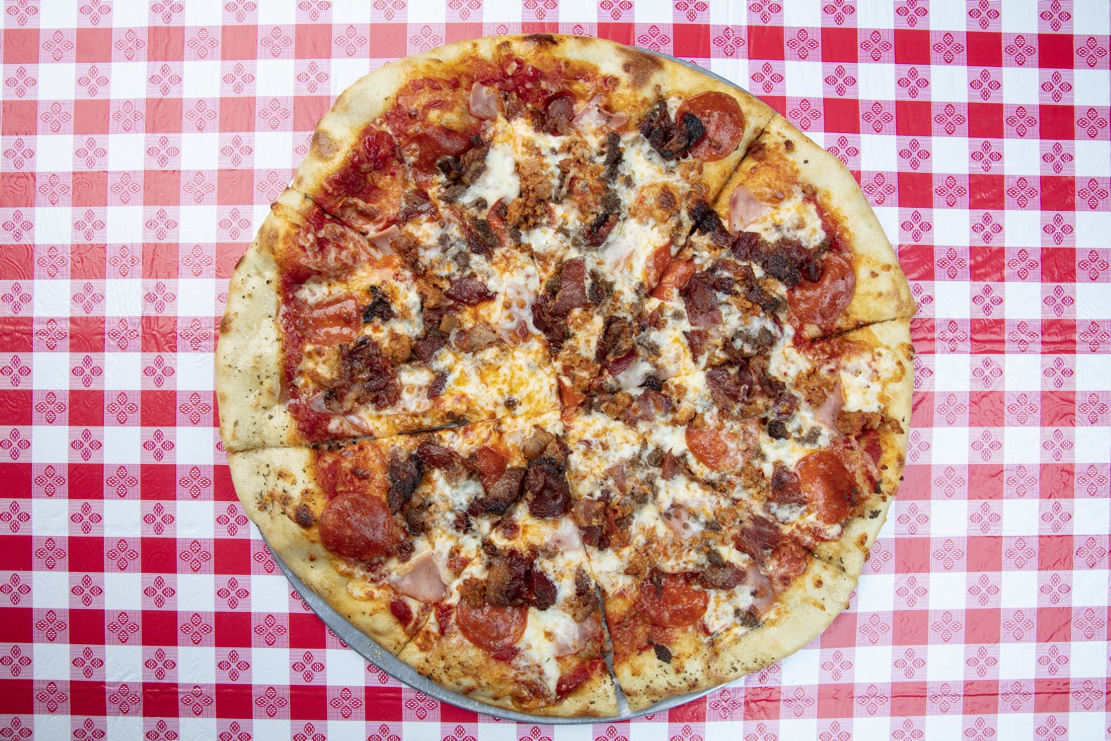 Order Carnivore Pizza - Personal 10'' food online from Papa's Italian Restaurant store, Florence on bringmethat.com