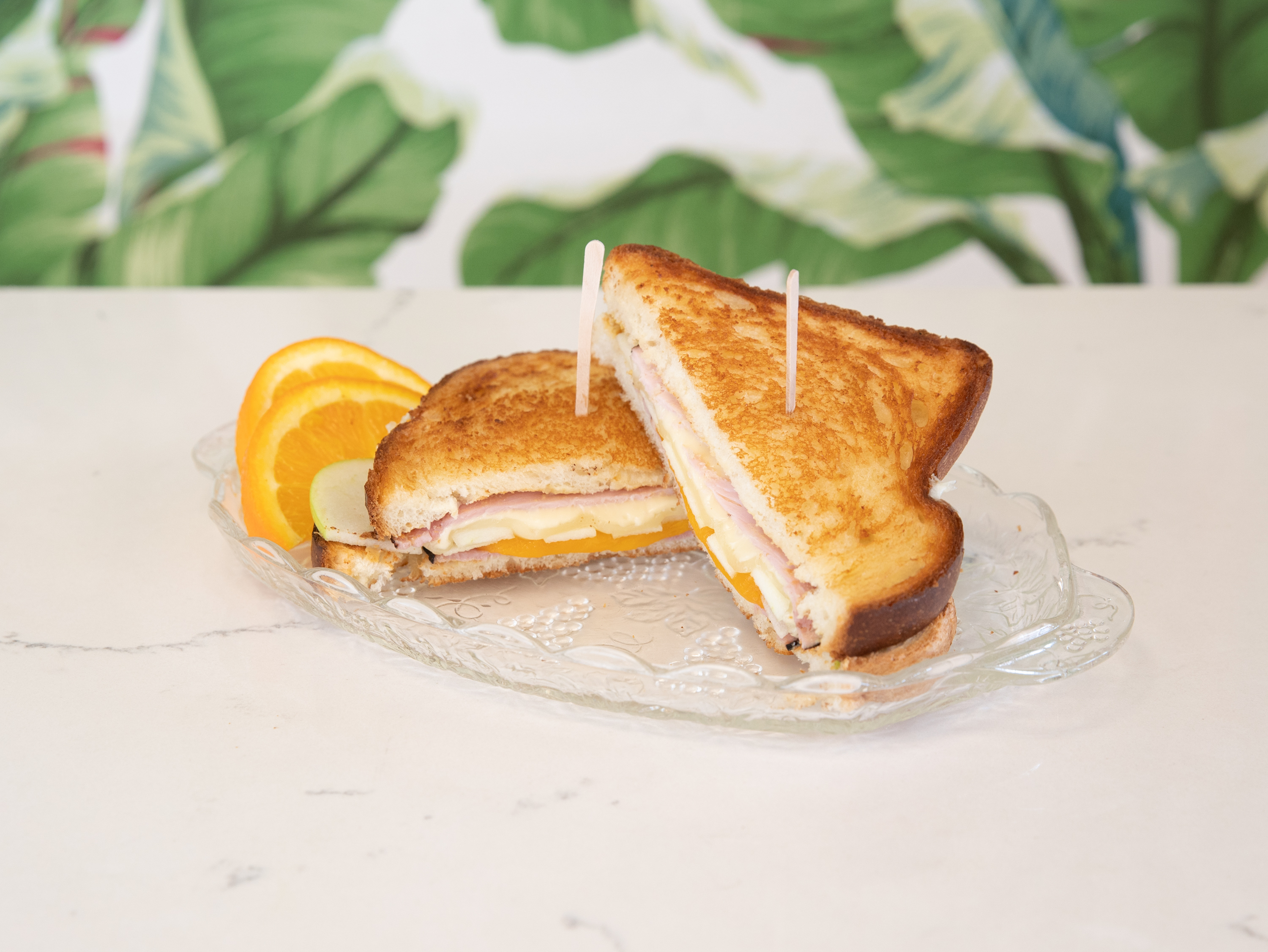 Order Grilled Ham and Cheese Sandwich food online from Classics Flowers Cafe Bakery store, Cypress on bringmethat.com