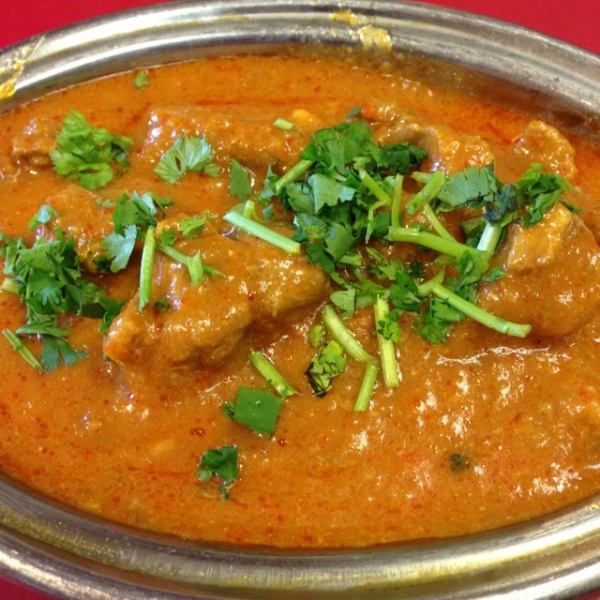 Order Lamb Curry food online from Indian Domino's Pizza store, San Francisco on bringmethat.com
