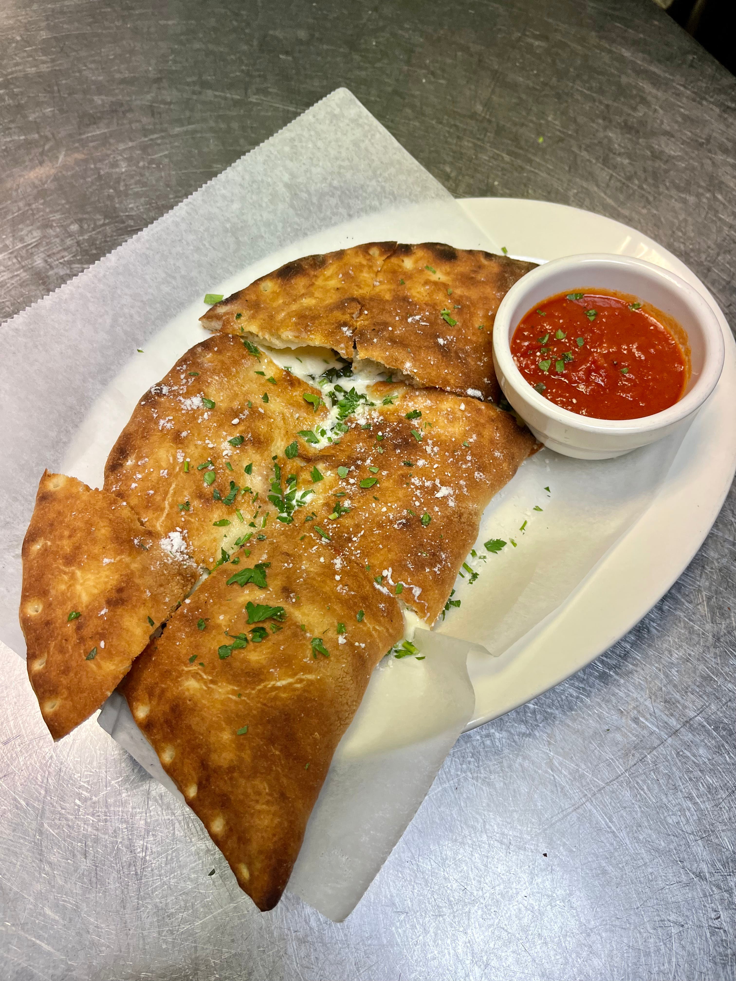 Order Small 10" Calzone - Calzone food online from John Of Bleecker Street store, New York on bringmethat.com