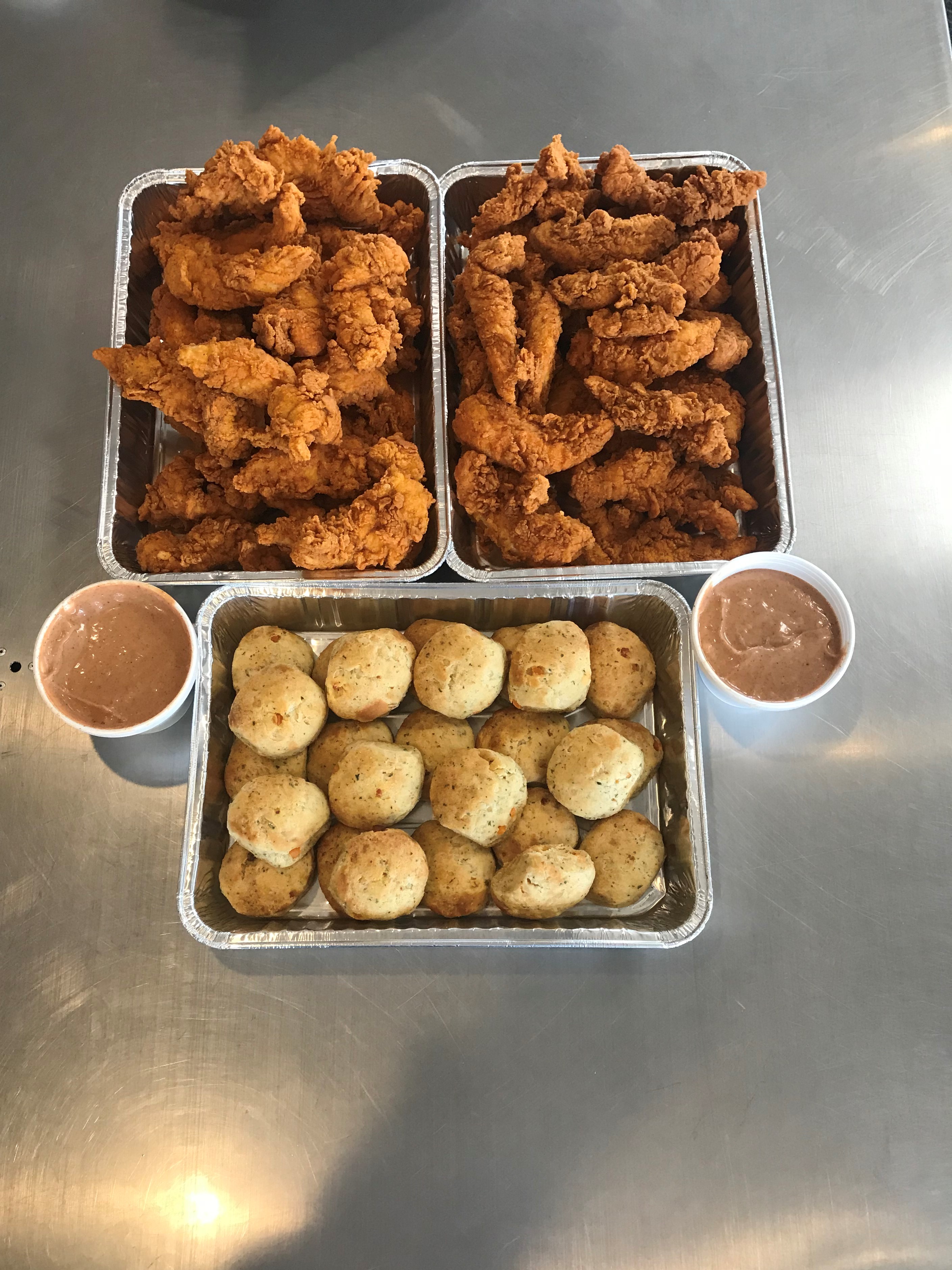 Order 50 Tenders and 20 Cheddar Biscuits food online from Cocky's Chicken and Brew store, Lincoln on bringmethat.com