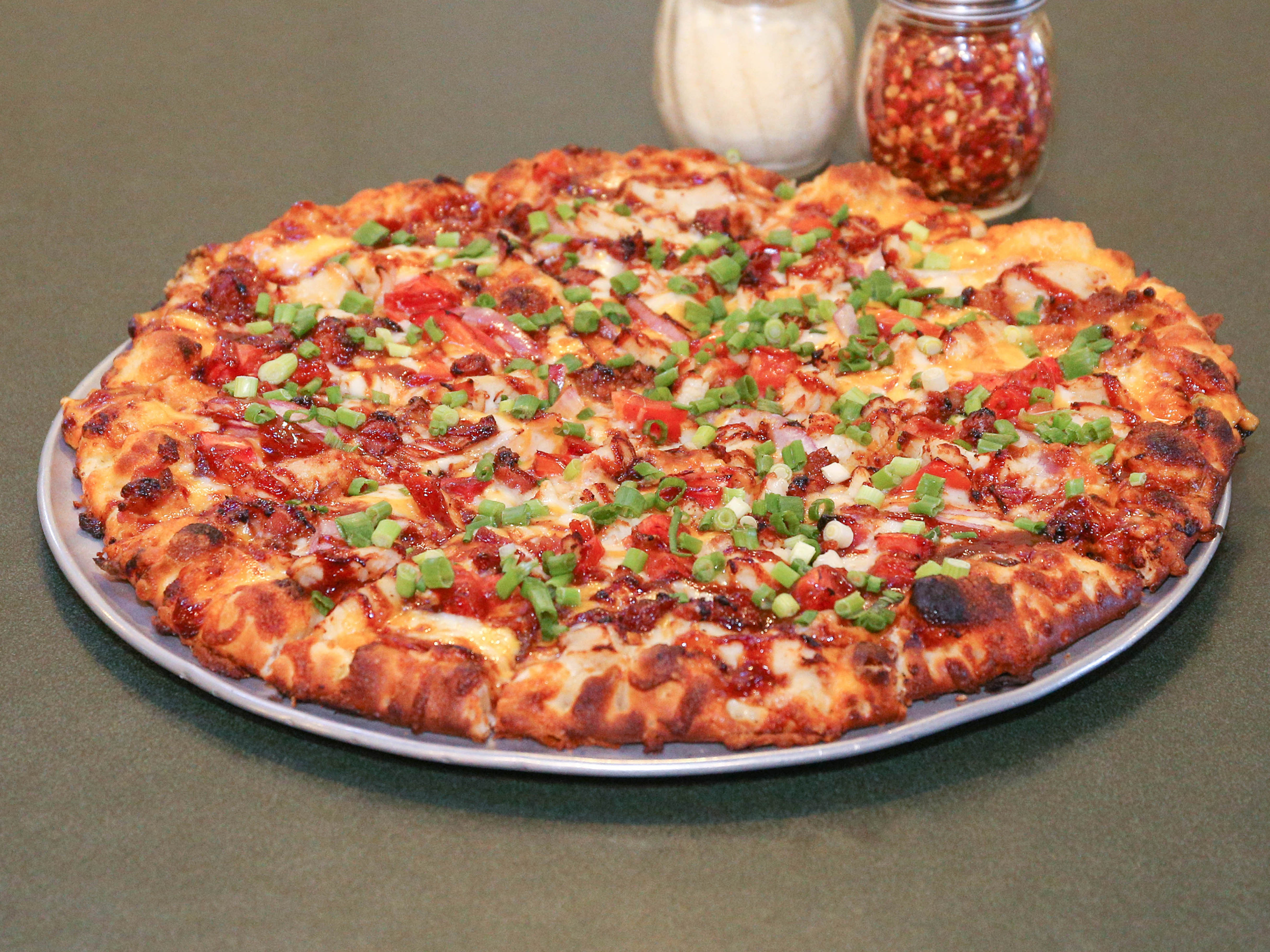 Order BBQ Chicken Pizza food online from Round Table Pizza store, Menlo Park on bringmethat.com