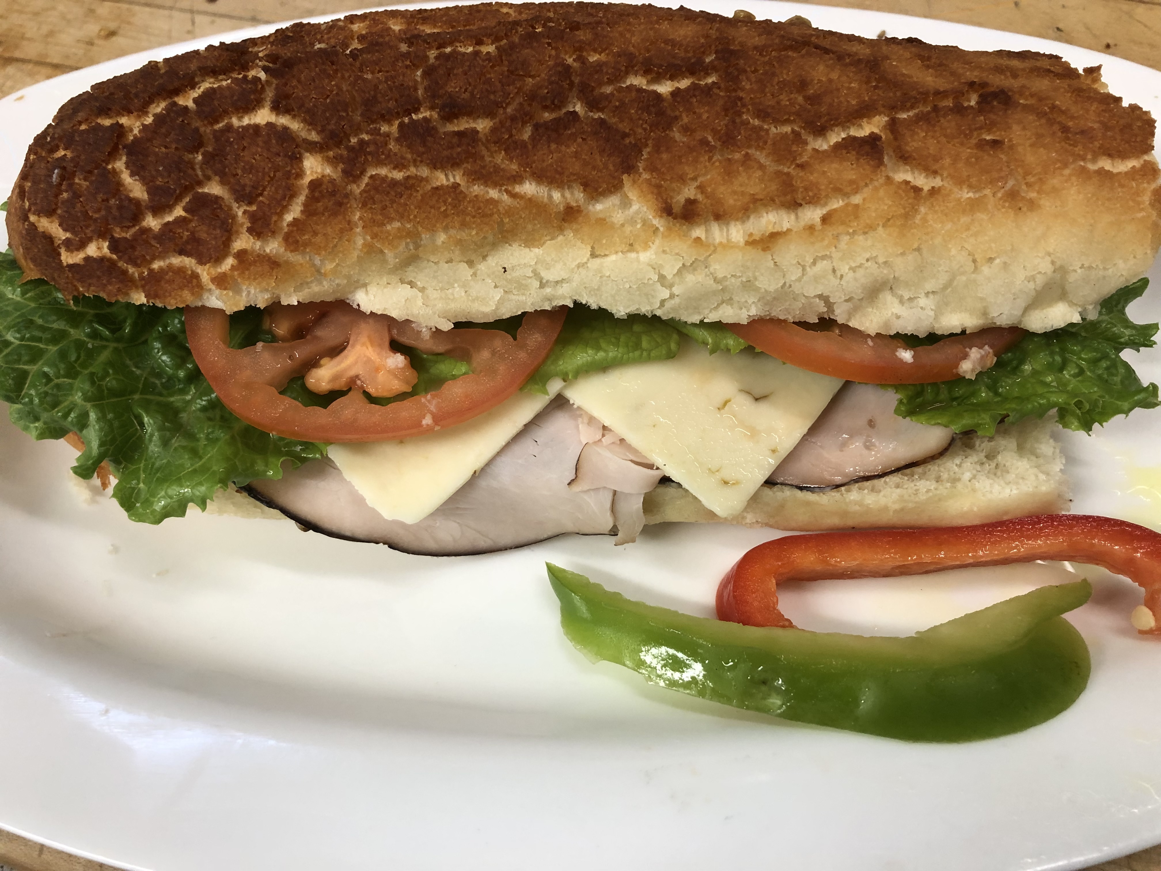 Order Turkey Club bacon provolone cheese  food online from Lucca Deli store, San Francisco on bringmethat.com
