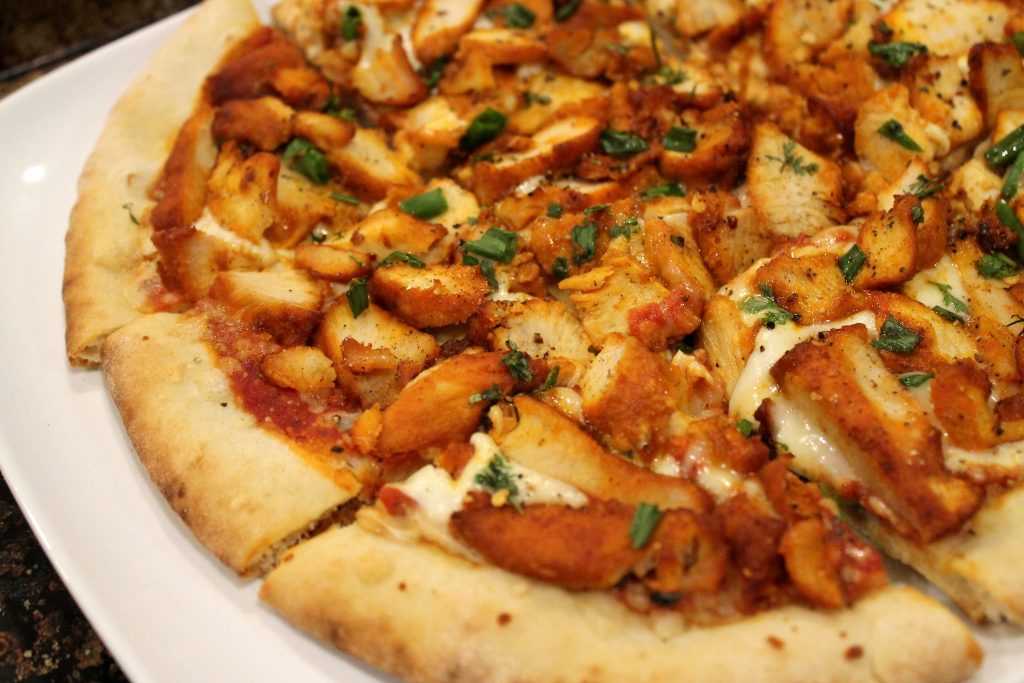 Order Tandoori chicken Meat Pizza food online from Oasis Palace Restaurant store, Newark on bringmethat.com