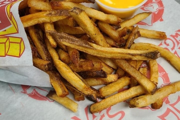 Order Bag "O" Fries with Cheese Sauce food online from Devil Dawgs store, Chicago on bringmethat.com