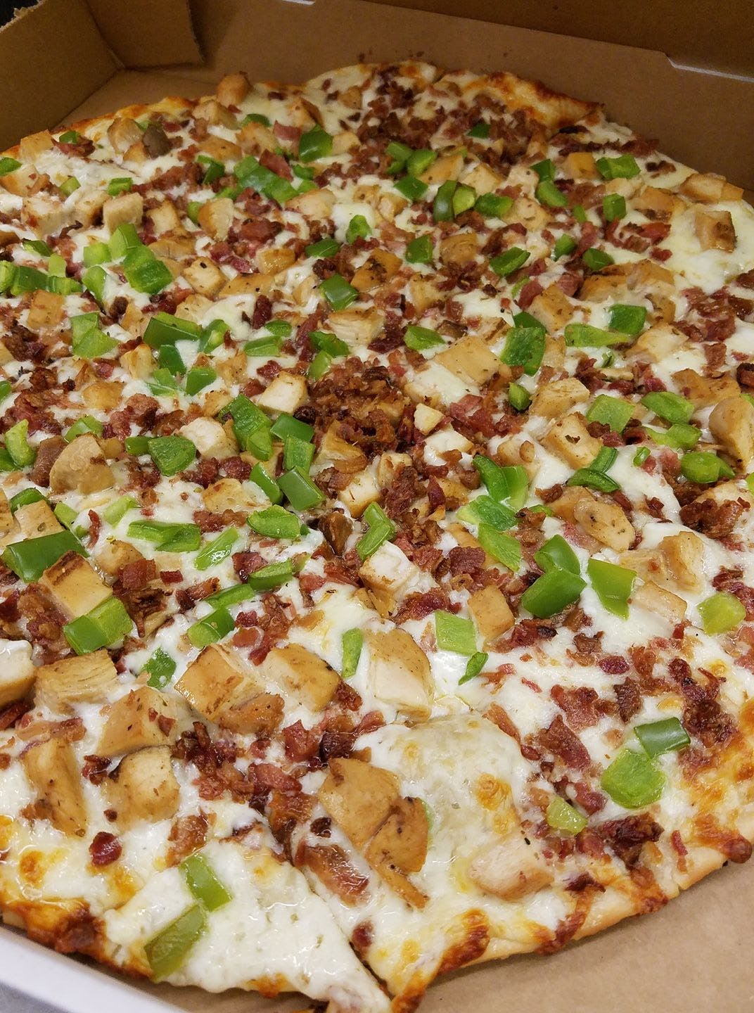 Order Chicken Bacon Ranch Pizza - Small 12" food online from Saucy Sisters Pizzeria store, Leesburg on bringmethat.com