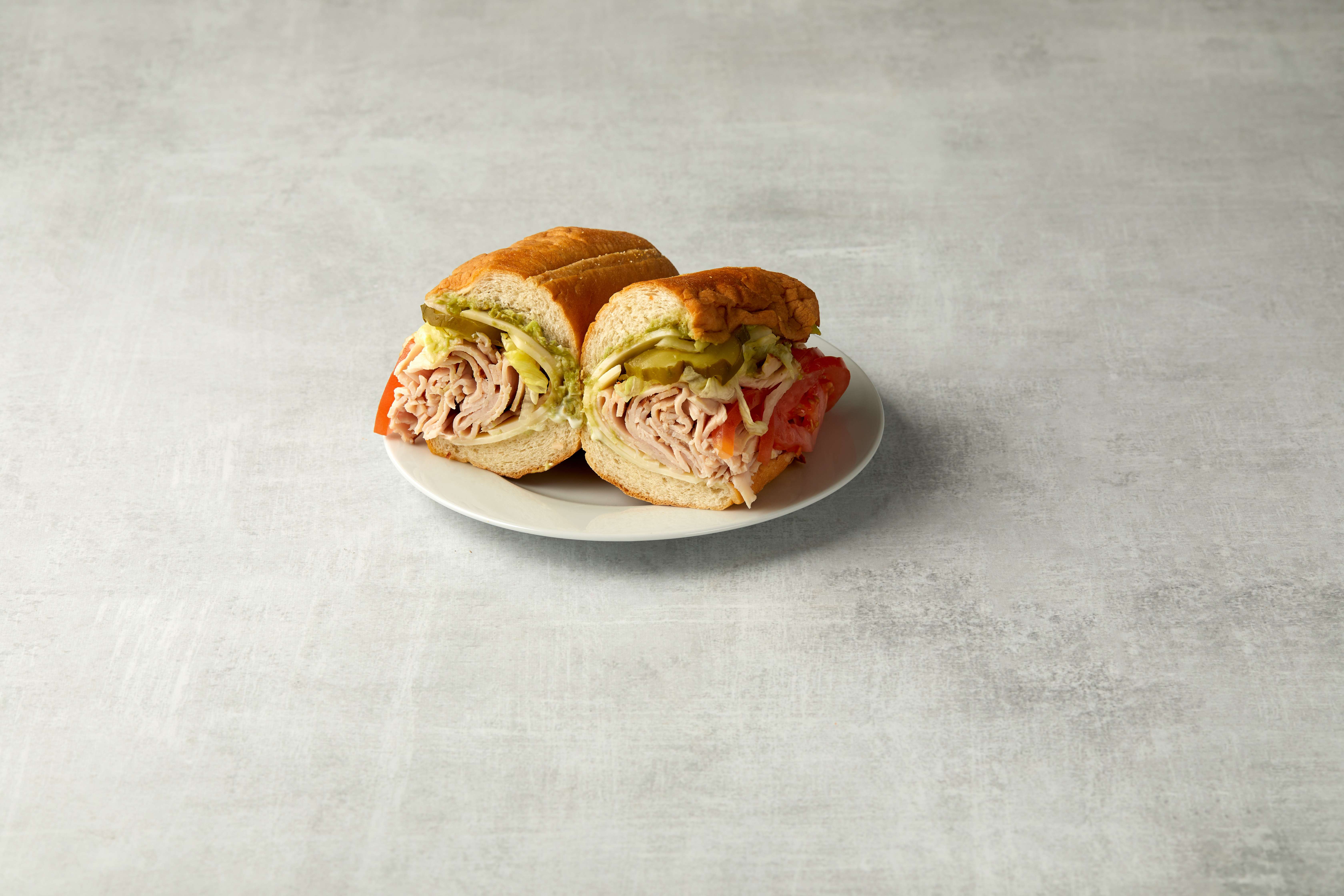 Order Turkey, Avocado and Cheese Cold Sandwich food online from Bread Basket store, Tustin on bringmethat.com