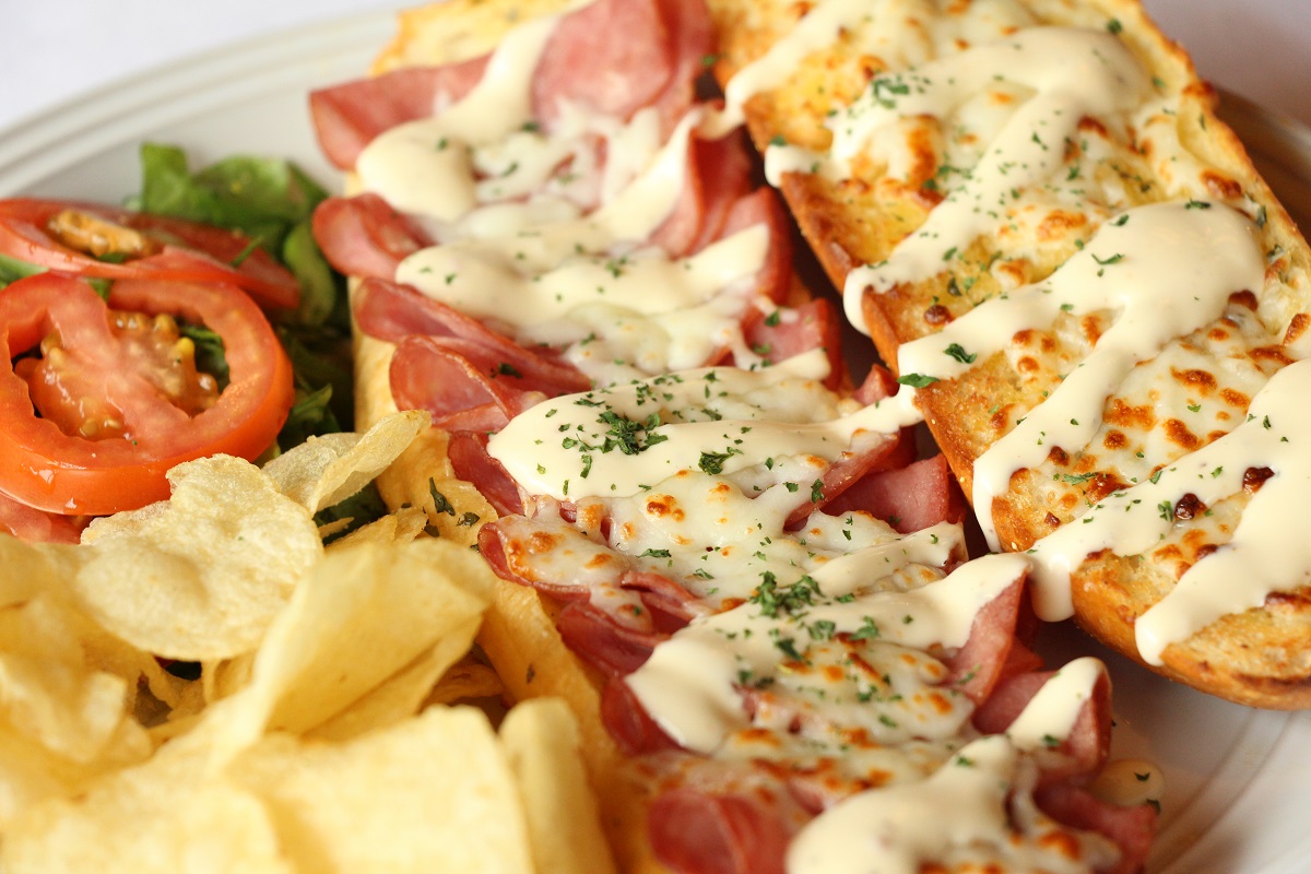 Order Hot Ham and Cheese Sandwich food online from Palio Pizza Cafe store, Venus on bringmethat.com