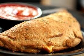 Order Calzone - Calzone food online from Top Class Pizza store, Fullerton on bringmethat.com