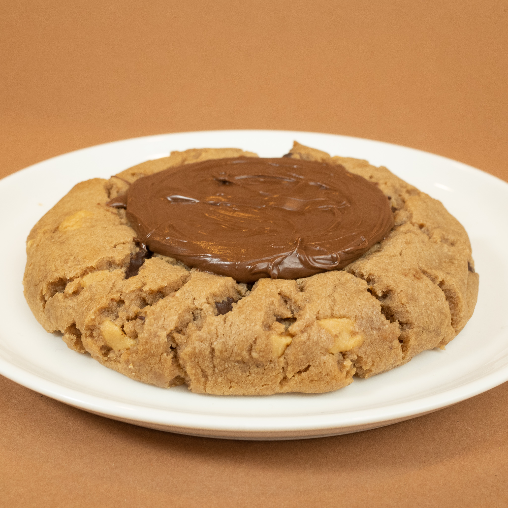 Order Gluten Free Nutella Peanut Butter Chocolate Chunk Cookie  food online from The Big Cookie Company store, Ridgefield on bringmethat.com