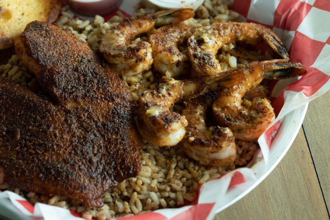 Order 12 Blackened Shrimp & 4 Blackened Fish Family Combo food online from 7 Spice Cajun Seafood store, Houston on bringmethat.com