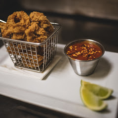 Order Fried Calamari with Fra Diablo Sauce food online from Cafe Nunez store, New York on bringmethat.com