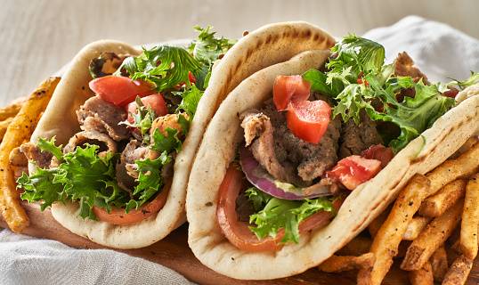 Order Traditional Gyro (Choose Meat Option) food online from Shawarma Express store, Portland on bringmethat.com