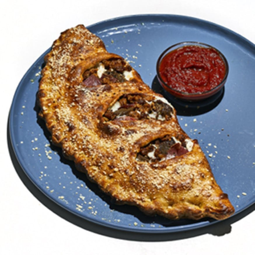 Order The Sausagefest Calzone - Calzone food online from Mellow Mushroom Pizza Bakers store, Denver on bringmethat.com