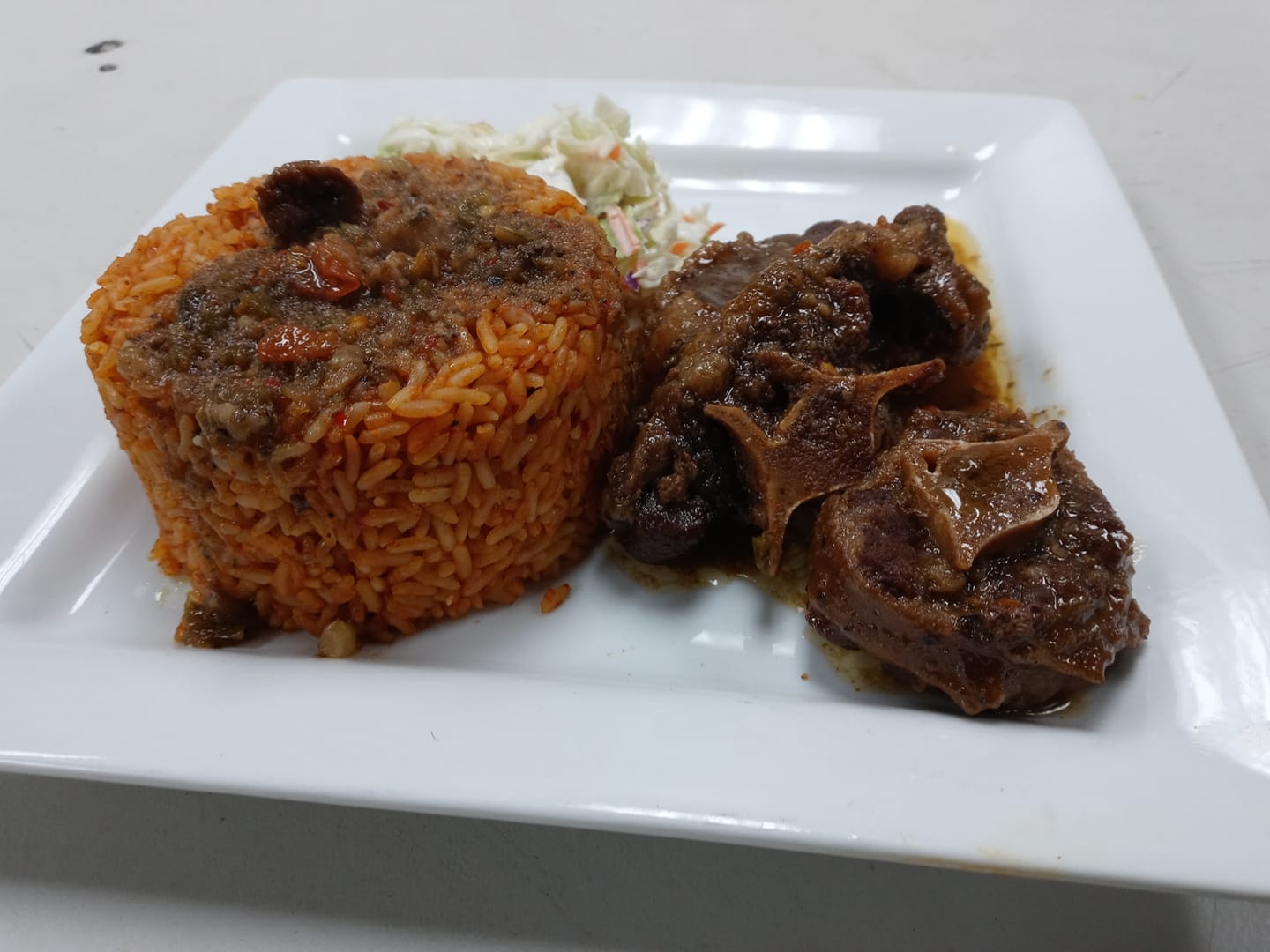 Order Oxtail plate food online from Soul of Afrika store, Las Vegas on bringmethat.com