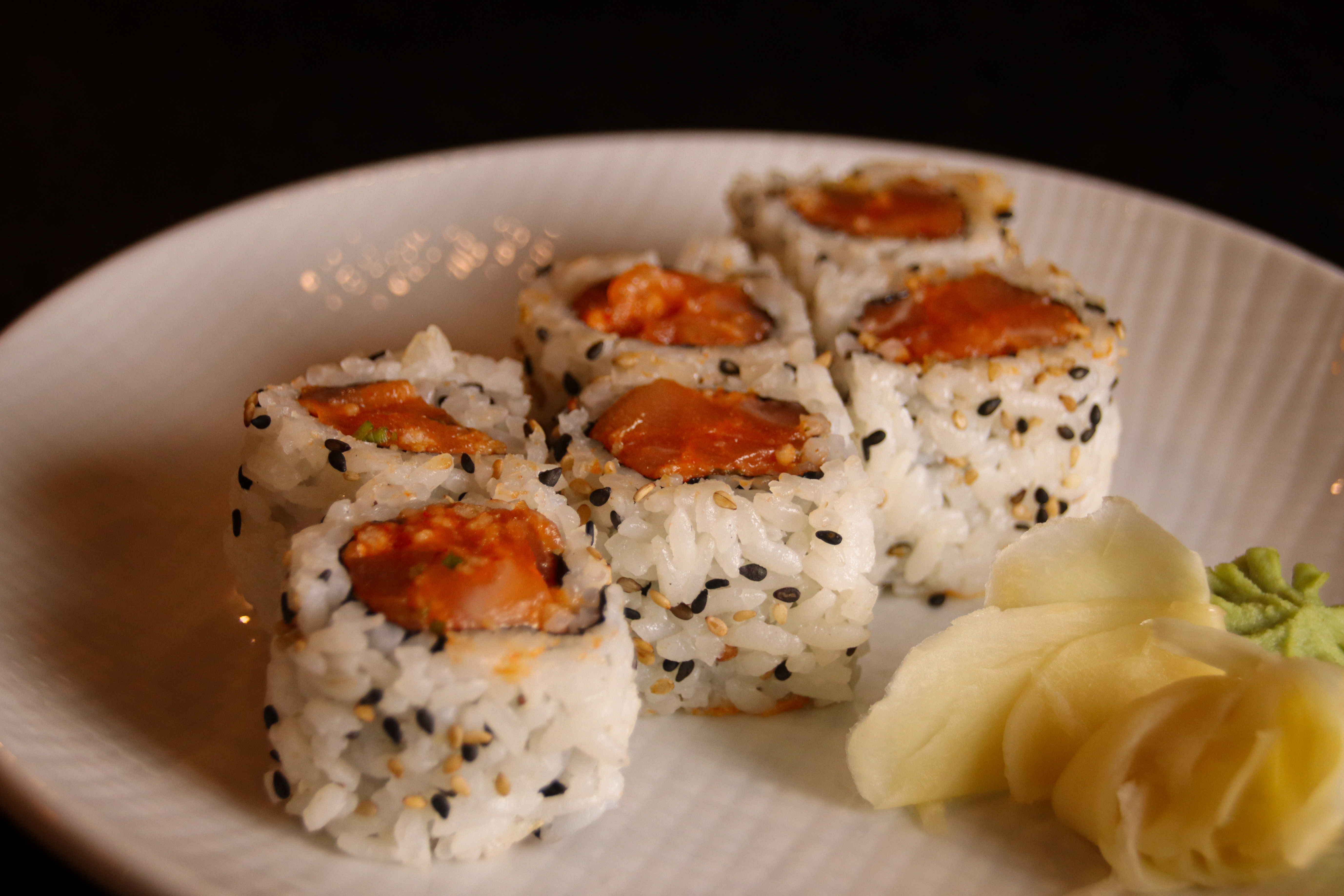Order Spicy Salmon Roll food online from Screaming Tuna Milwaukee store, Milwaukee on bringmethat.com