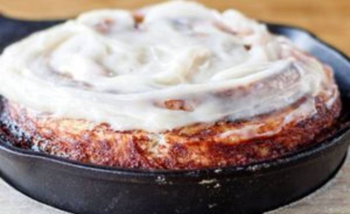 Order Skillet Cinnamon Roll food online from Pucketts Grocery & Restaurant store, Franklin on bringmethat.com