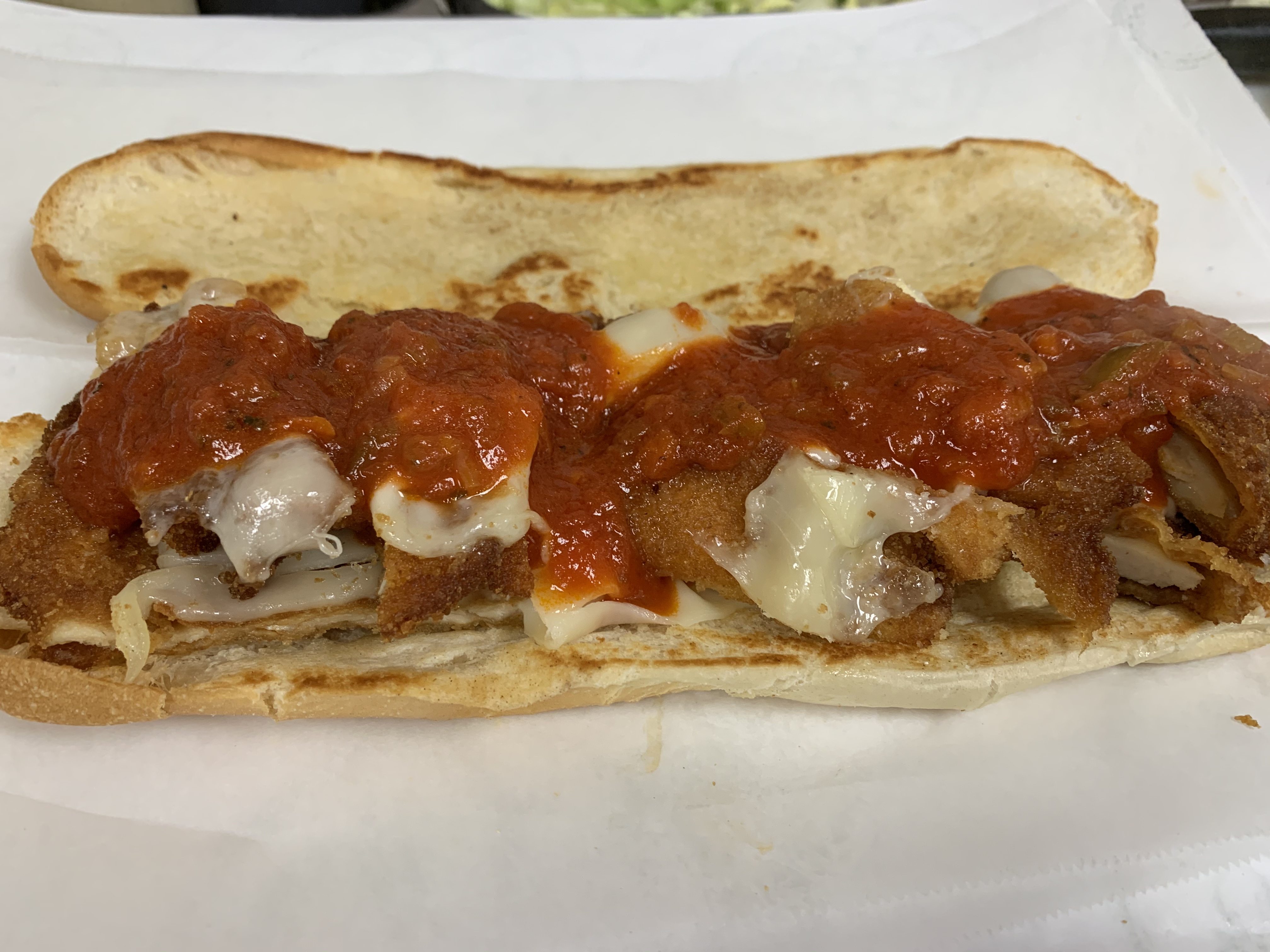 Order Chicken Parm Hero food online from Max Bialystok & Company store, Long Beach on bringmethat.com