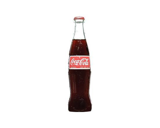 Order Mexican Coke 12oz food online from Pink Dot store, Lemon Grove on bringmethat.com