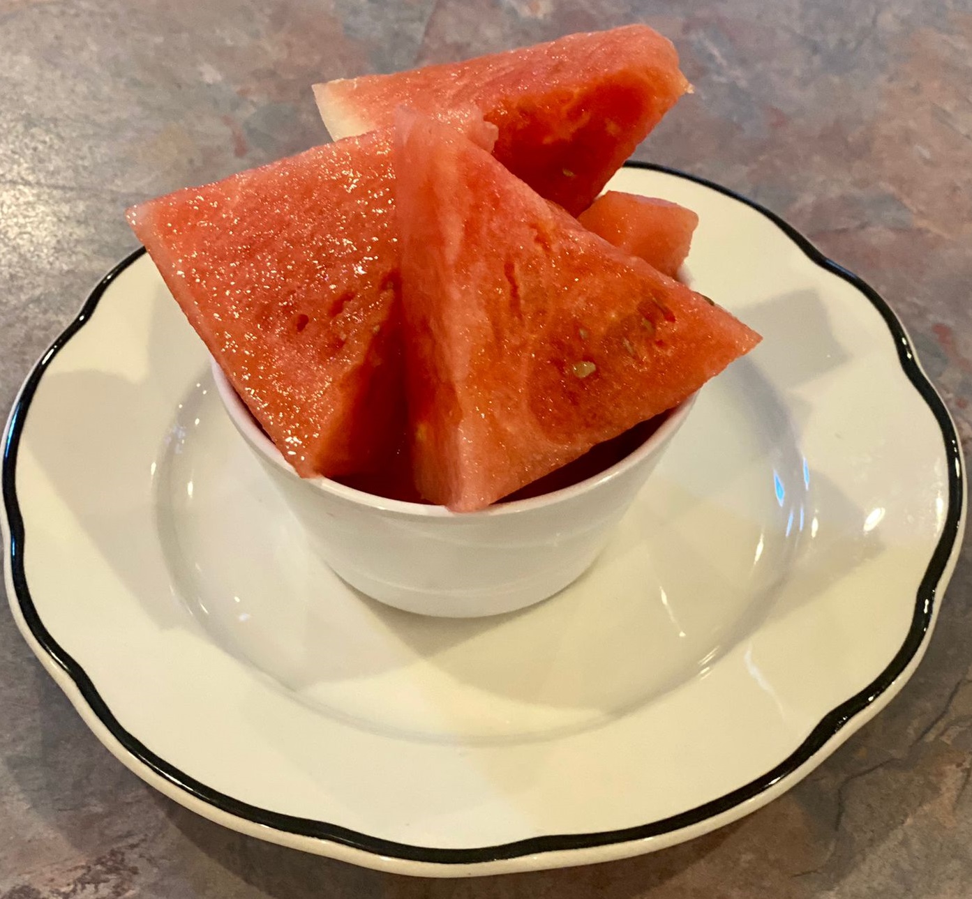 Order Watermelon (sliced) food online from Oliveiras Peabody store, Peabody on bringmethat.com